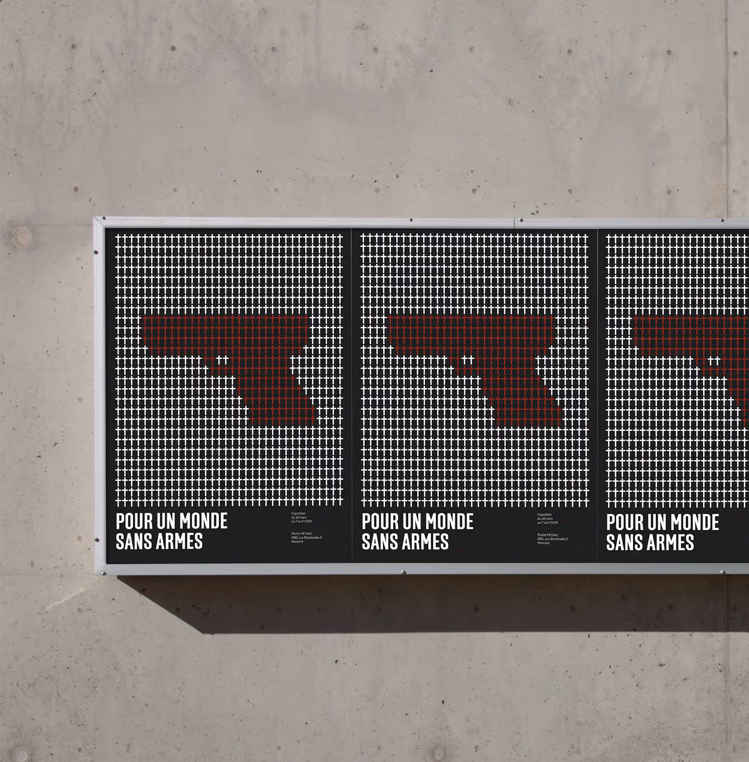 Posters showing gun shape made of red crosses among white crosses with text for a world without guns. Credit: Bendito Mockup