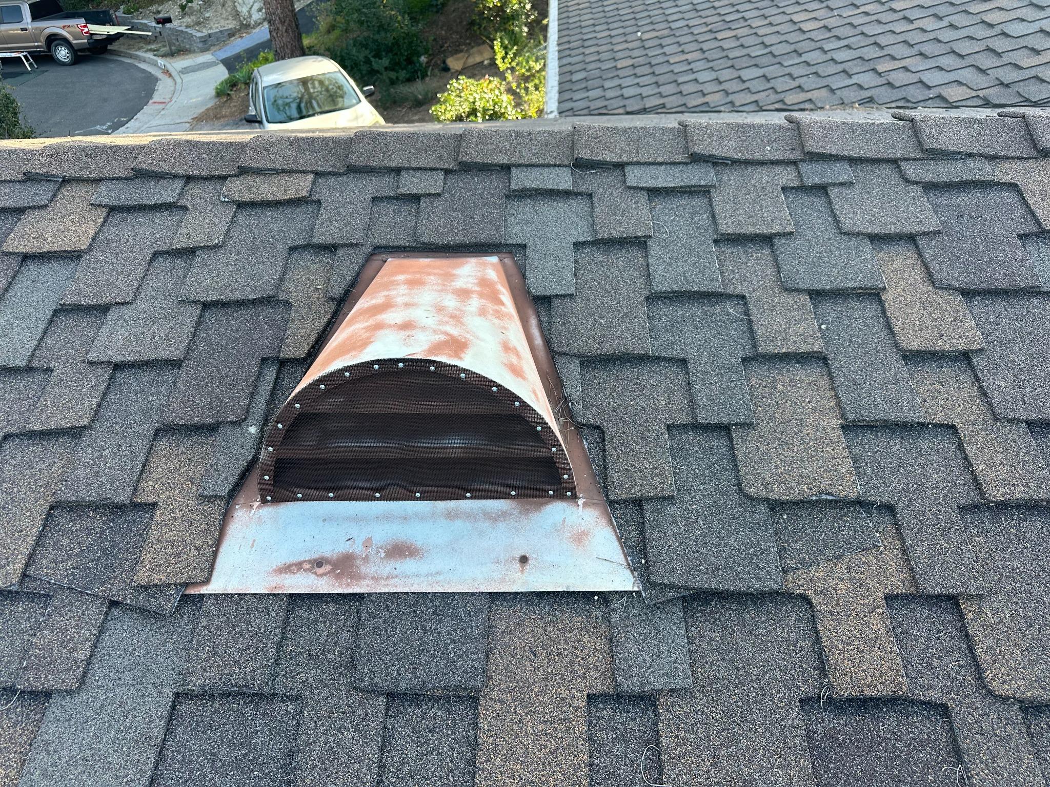 Roof vent on a shingled home in Ventura County — ember-resistant vent replacement by Wildfire Warden