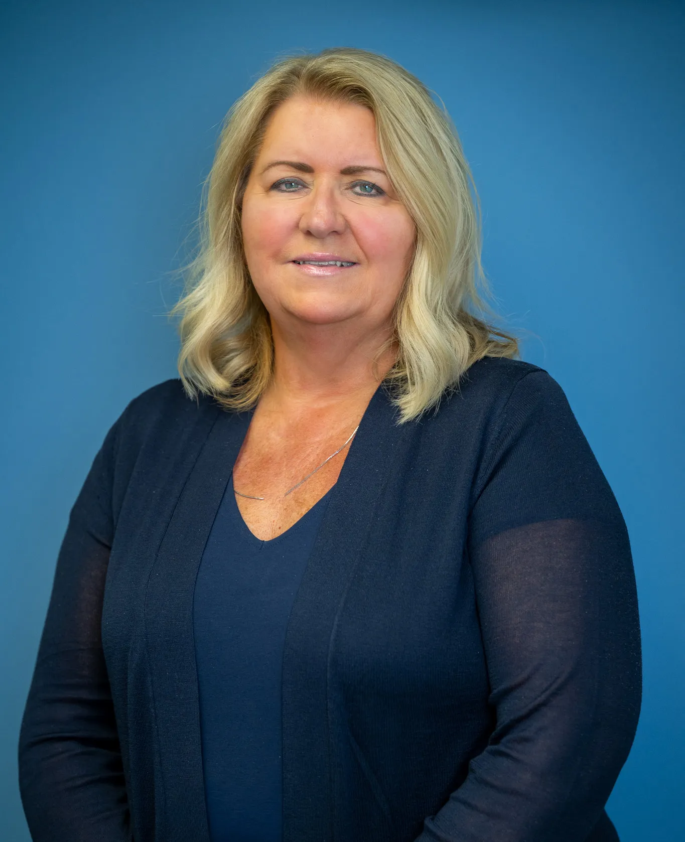 A headshot of Cindy Hodge, the project assistant of Brightleaf Glass and Metal Co.