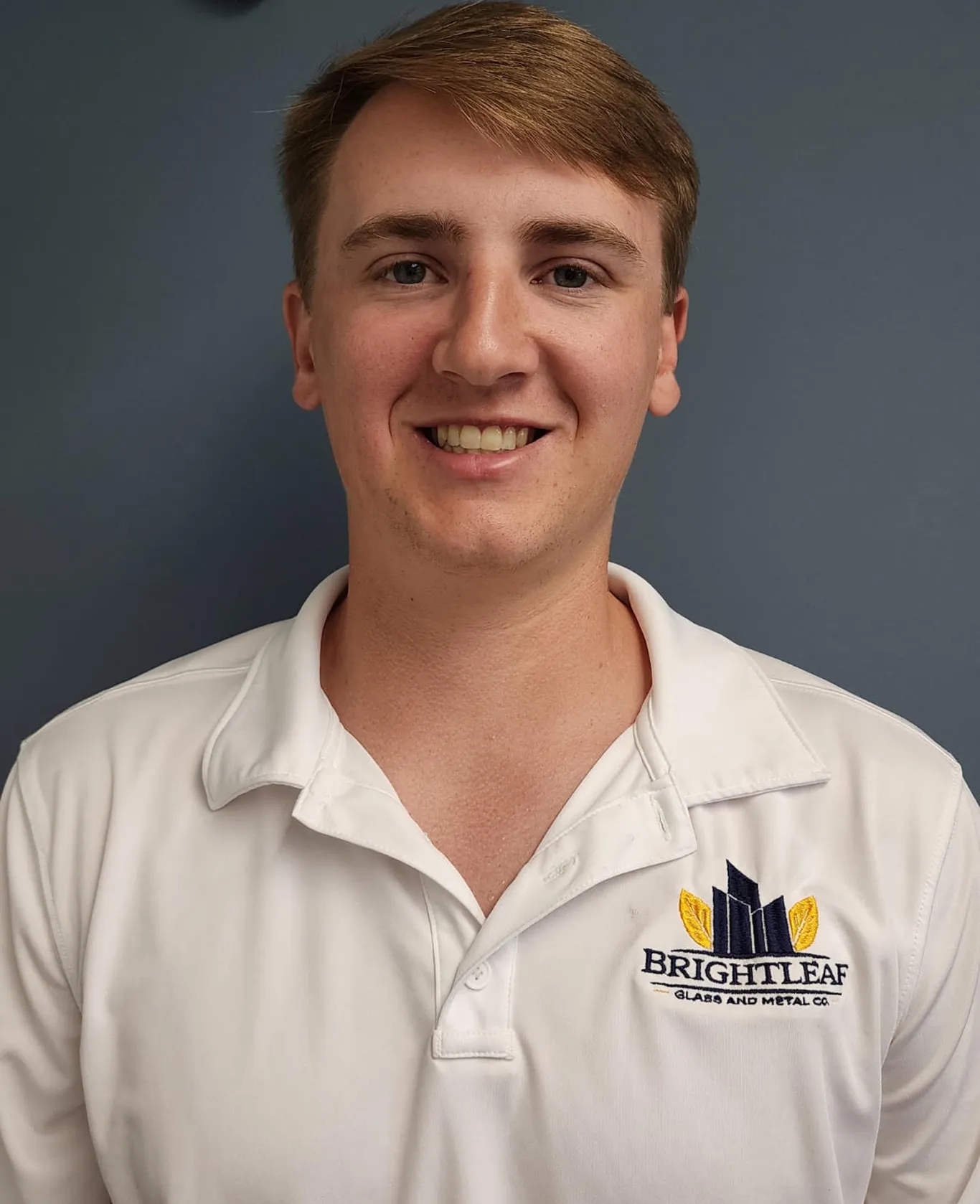 A headshot of Walker Ward, Assistant Project Manager at Brightleaf Glass and Metal Co.