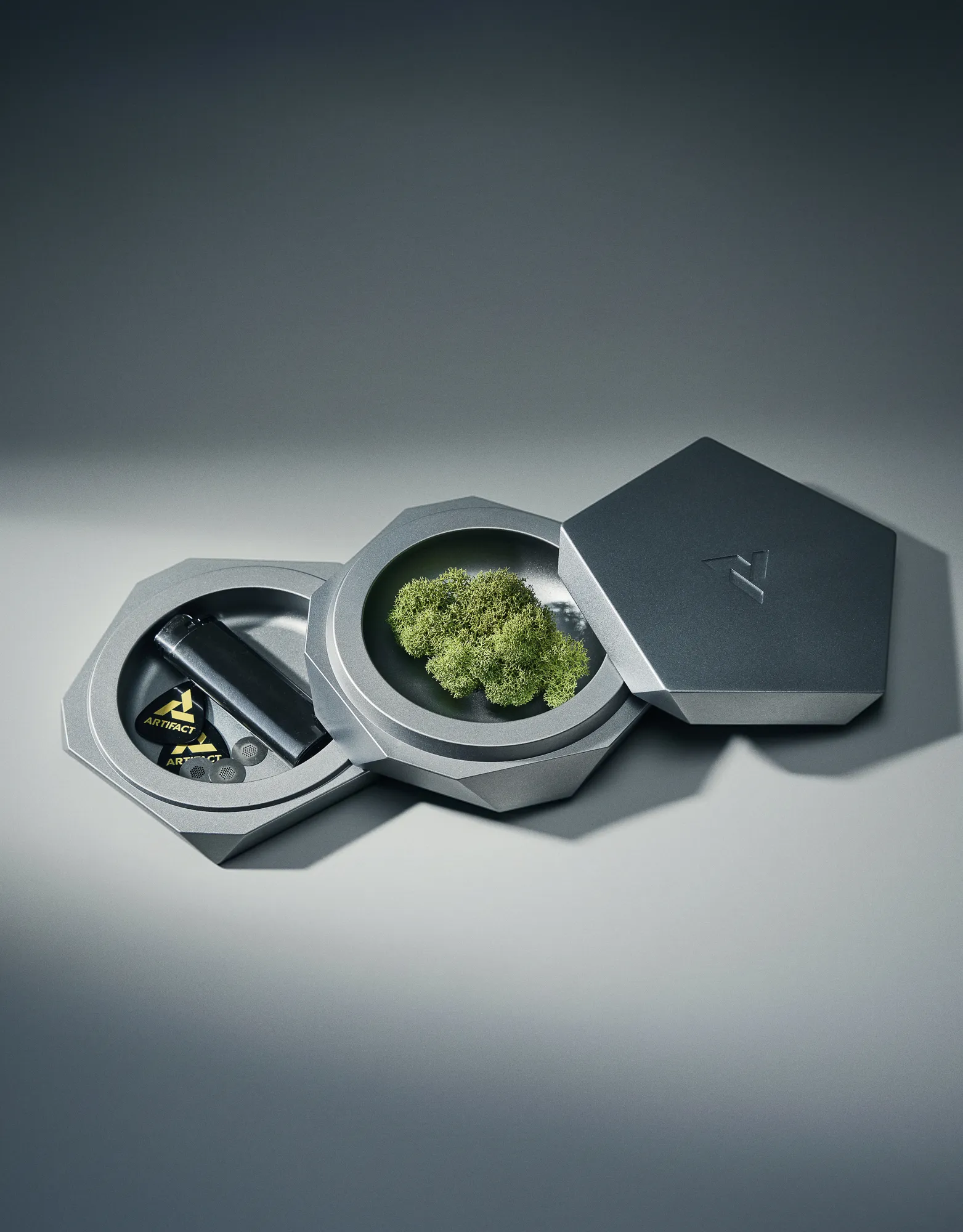 Vesta modular container opened to reveal storage compartments for accessories and botanicals
