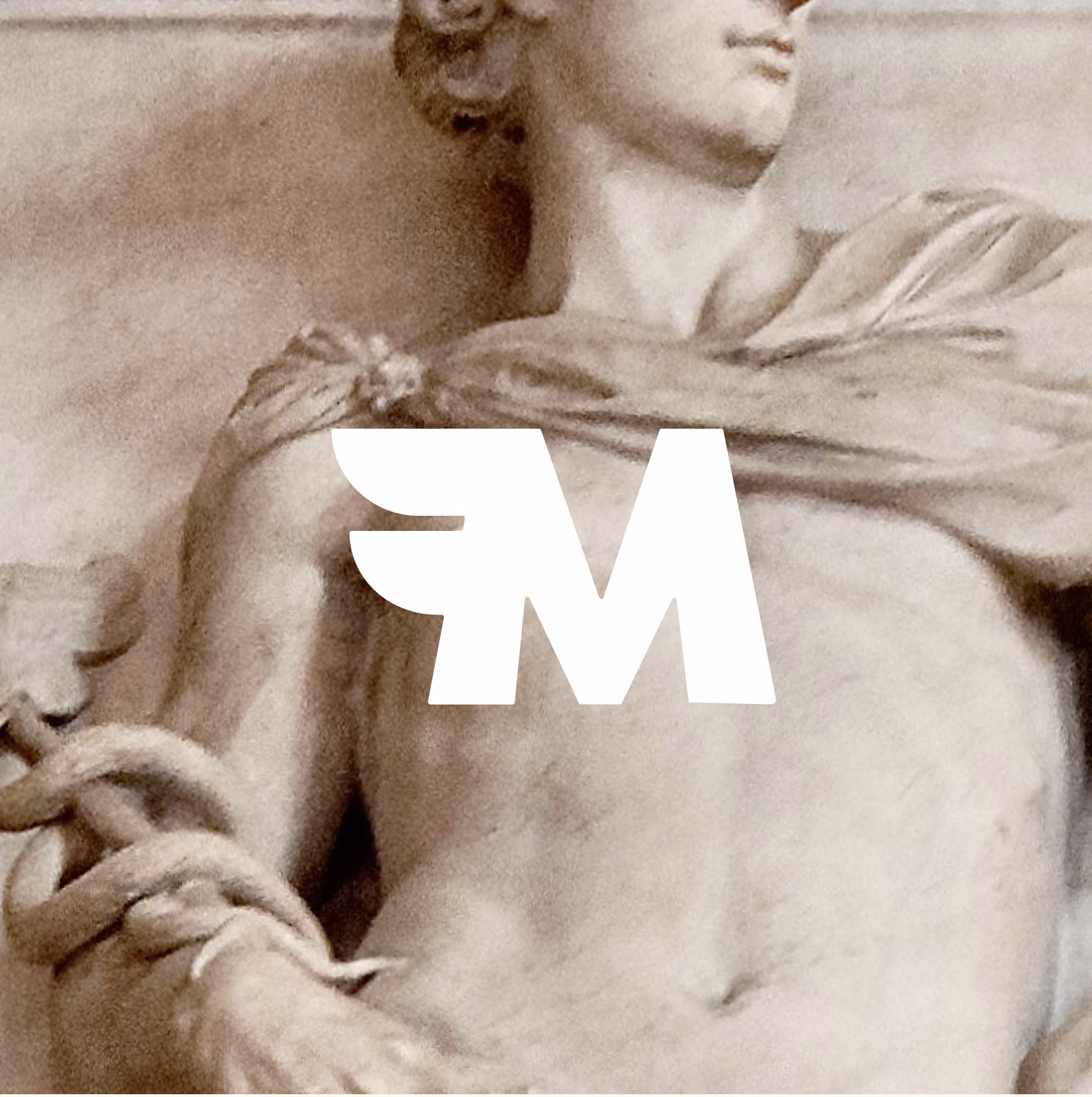 Close-up of a classical statue's torso and face, with a draped cloth and coiled staff on the arm.