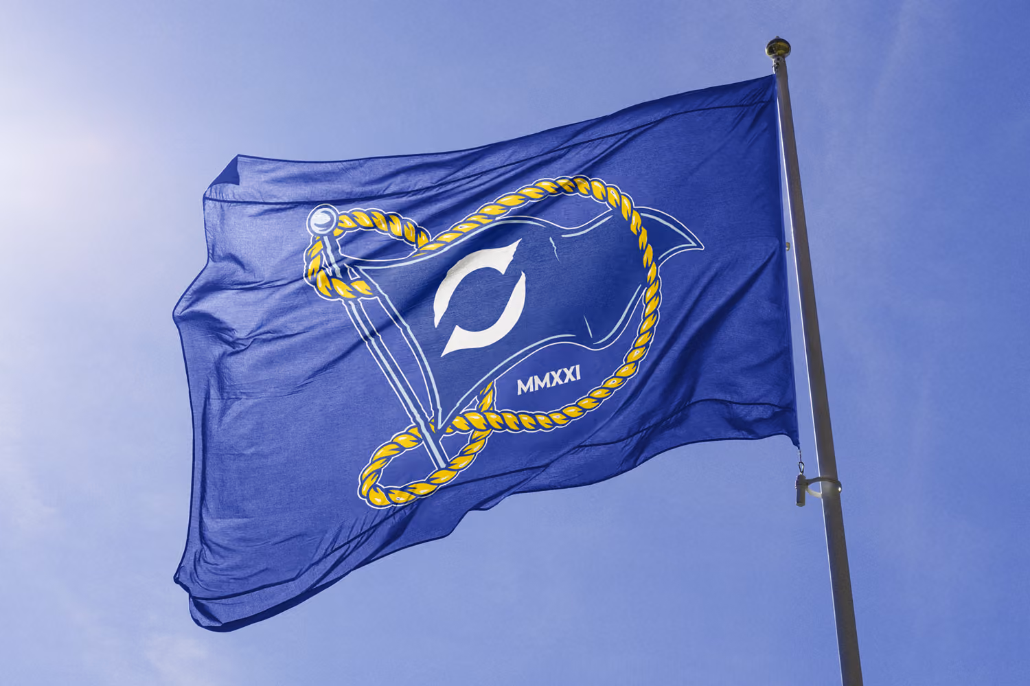 Blue flag with a white stylized letter C inside a yellow rope loop and Roman numerals MMXXI.