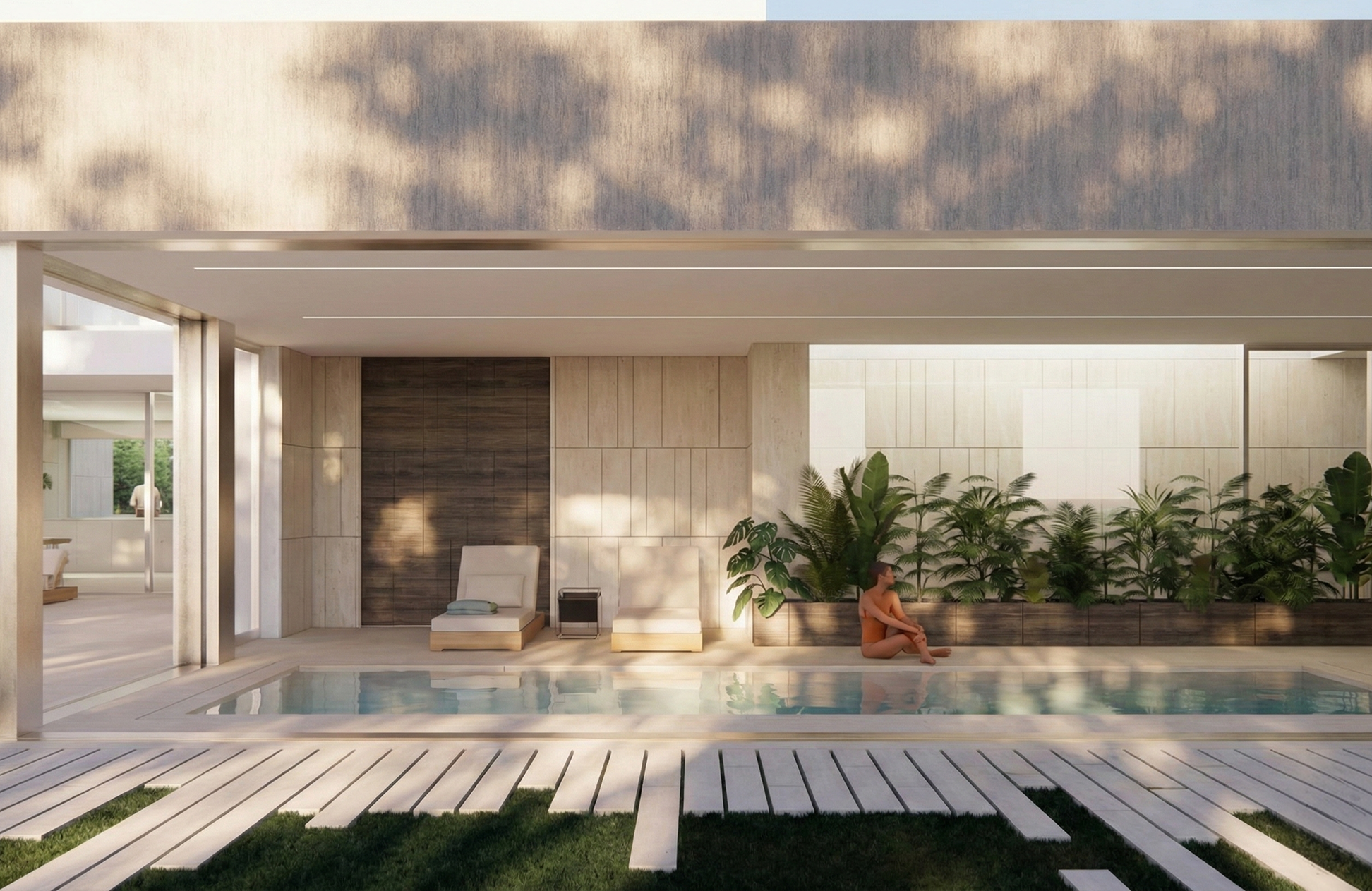 Modern outdoor pool area with lounge chairs, plants, and a person sitting by the pool.