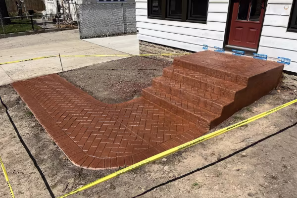Concrete front entry steps installed in West Michigan