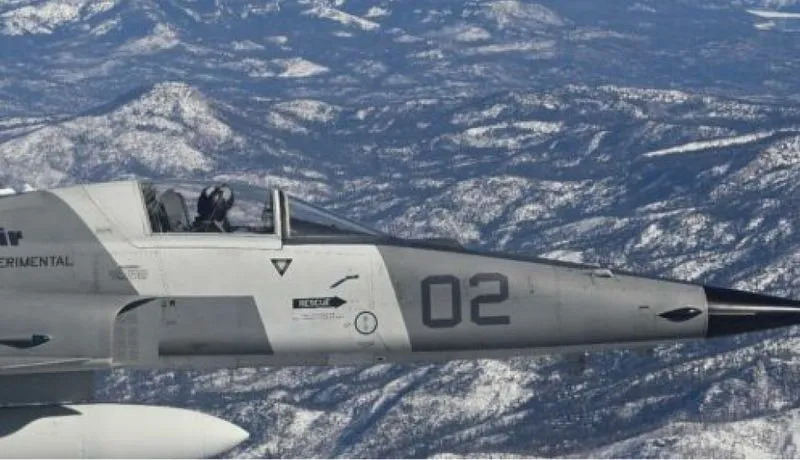 F5 in flight over snow mountains