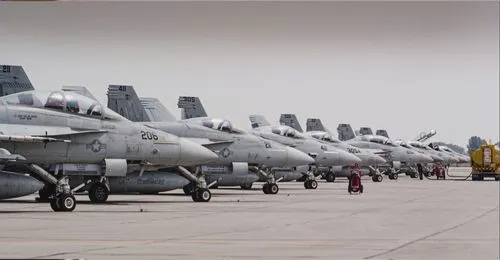 Jets aligned in formation on Tactical Air Support tarmac