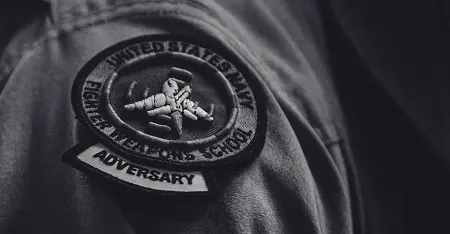 Tactical Air Support Adversary flight patch on arm black and white