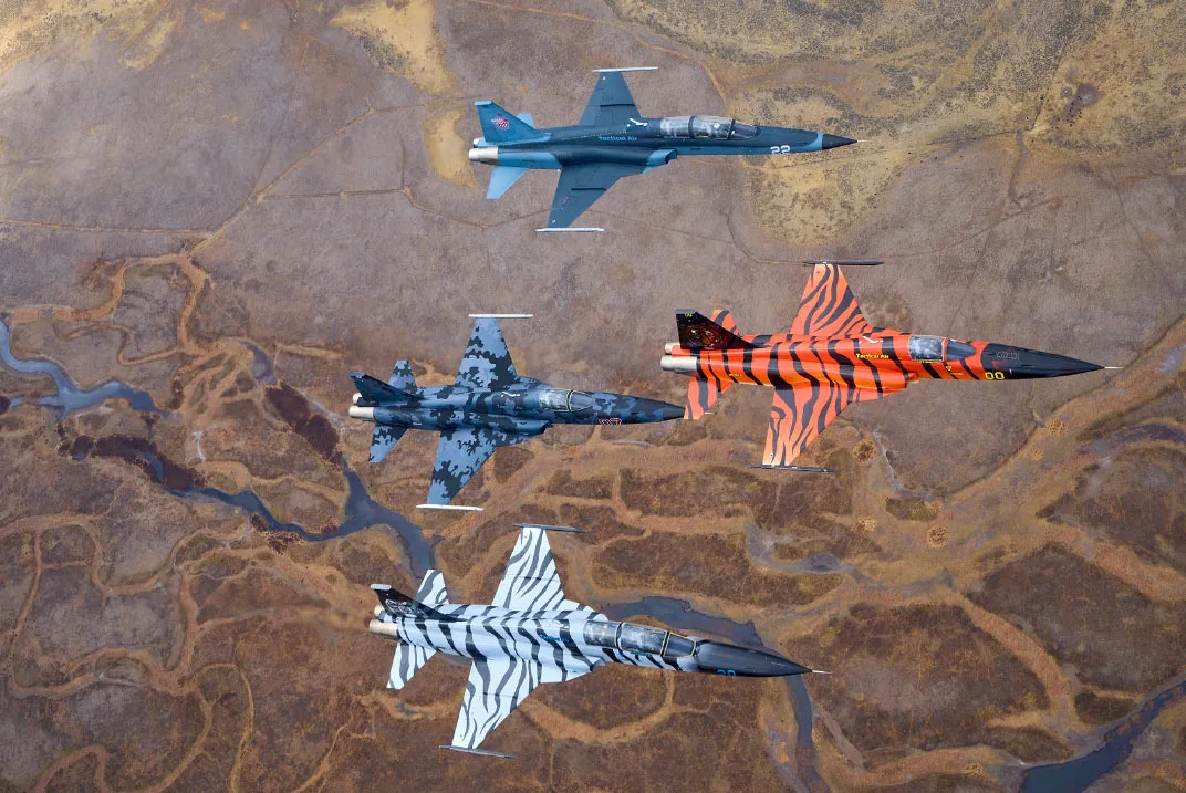Fleet of Tactical Air Support F5s flying in formation