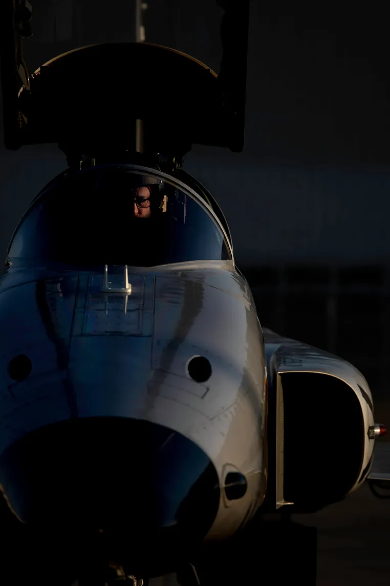 Pilot in cockpit of F5