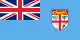 Flag of Fiji with blue field and Union Jack in upper left, and a shield on the right.