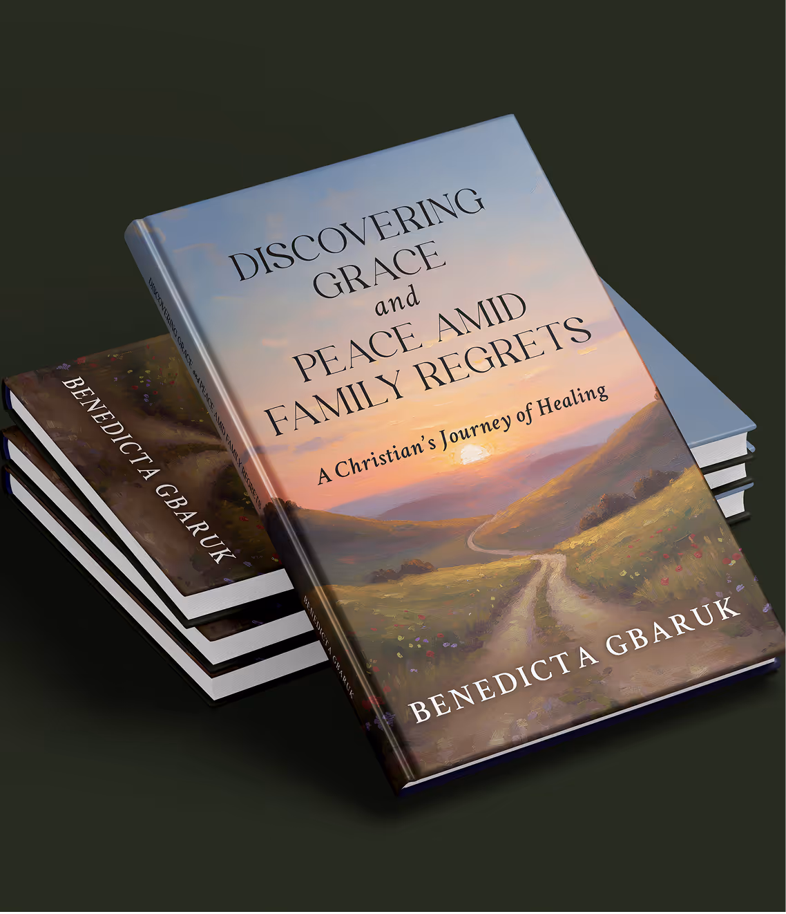 Stack of books with the top book titled 'Discovering Grace and Peace Amid Family Regrets: A Christian's Journey of Healing' by Benedicta Gbaruk featuring a sunset over a winding path landscape.