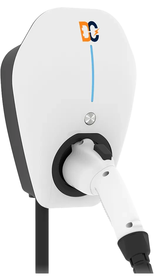 Wall-mounted electric vehicle charging station with a plugged-in white charging connector.