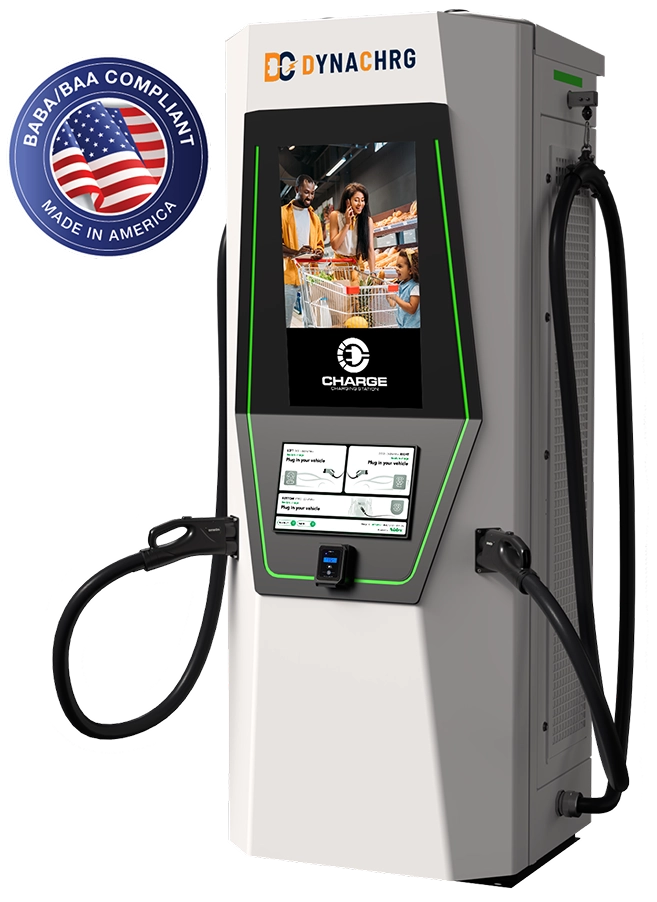 Dynachrg electric vehicle charging station with two charging cables and a digital screen showing a family shopping.
