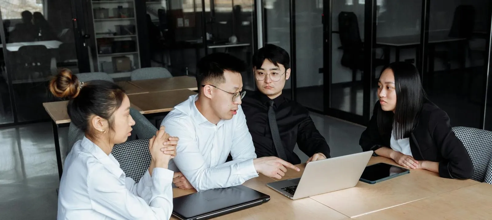 a group of people having a meeting