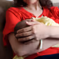 Mother holding her child at home