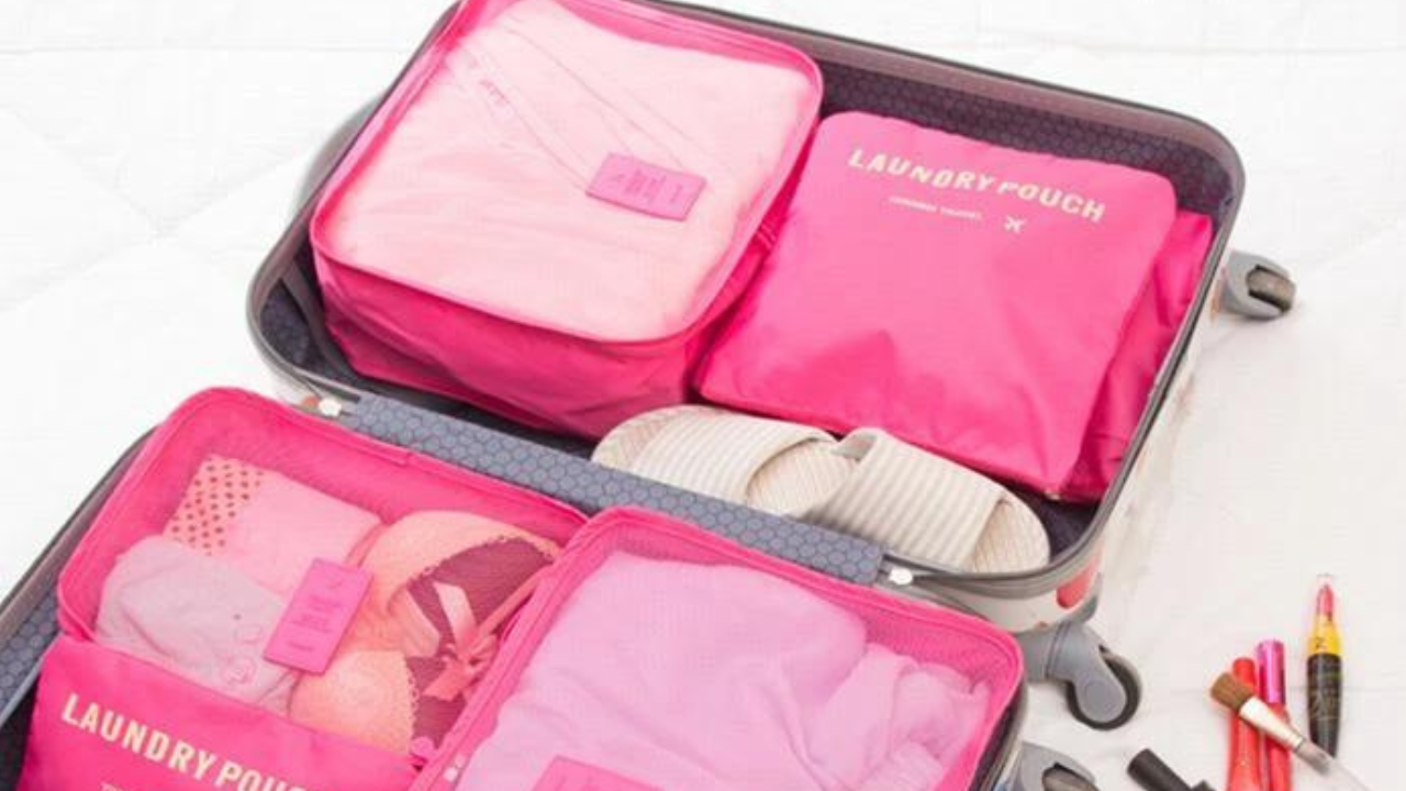 Packing cubes with mesh panels in several sizes