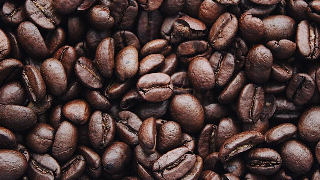Roasted coffee beans filling the frame