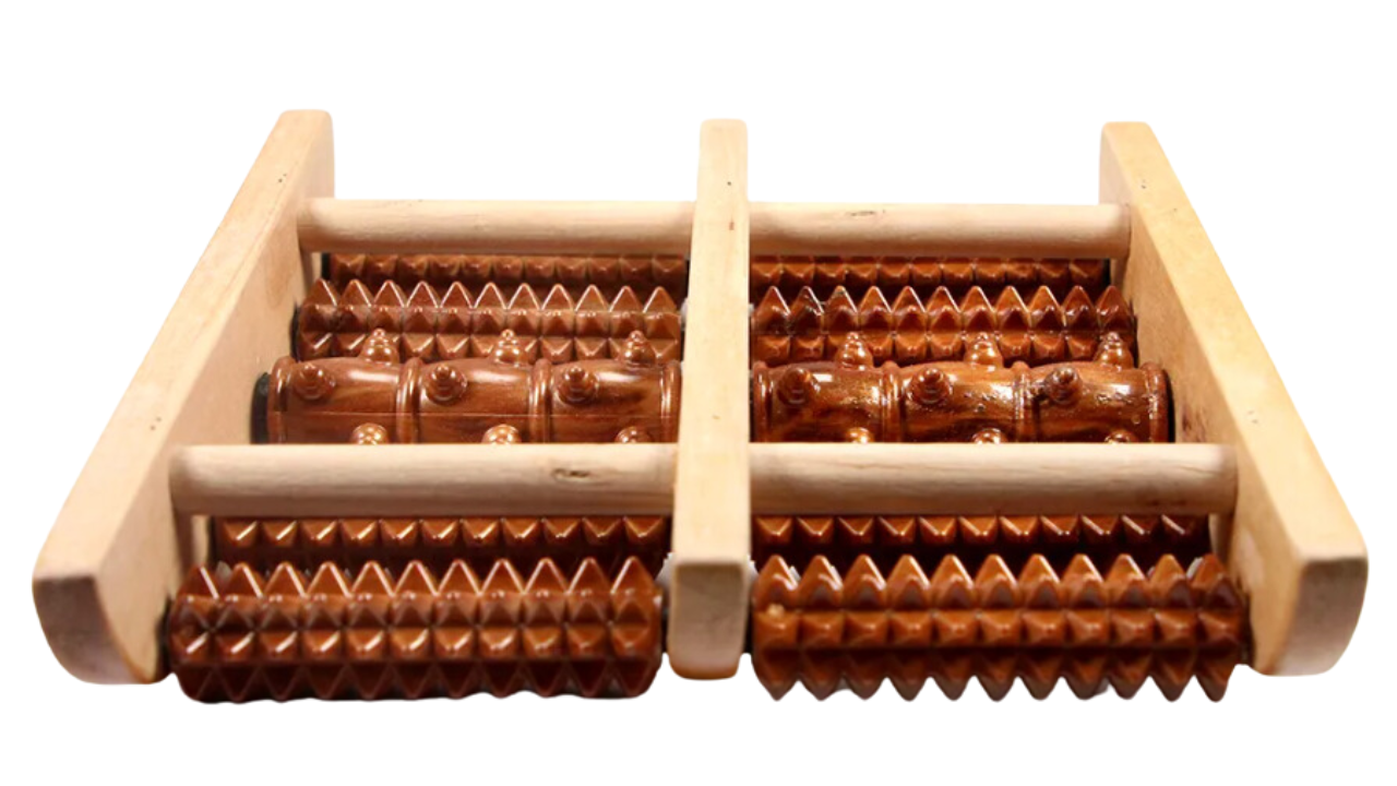 A wooden foot roller with multiple textured rollers in a light wood frame