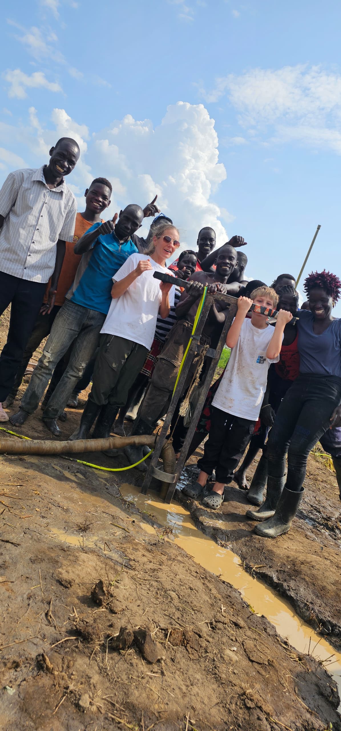 Kelly with the local well drilling team