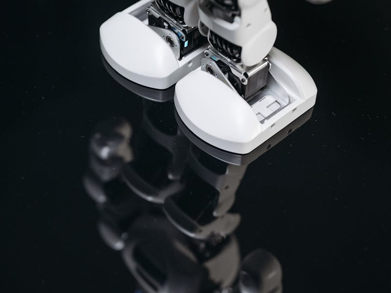 Unitree H1 humanoid robot on reflective surface industrial