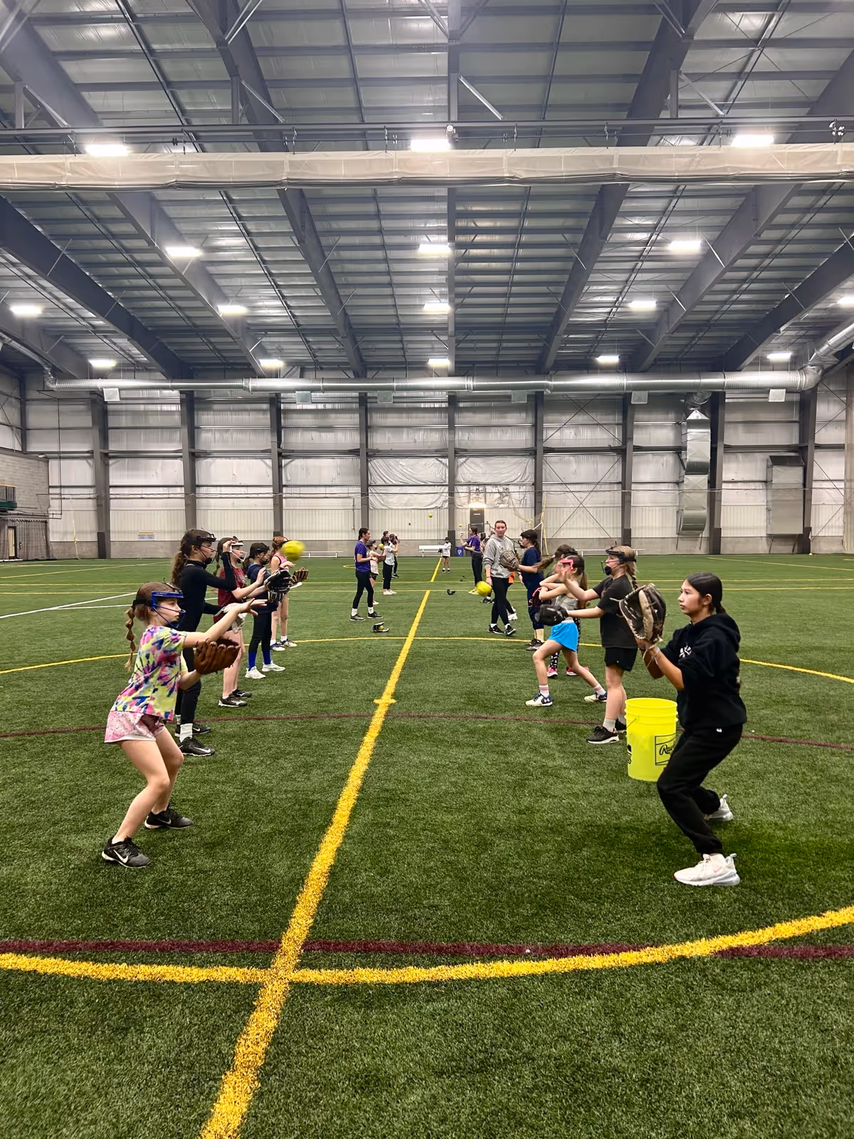 Players practicing catch during a training session
