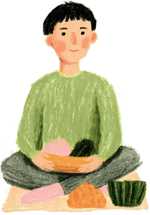 Illustration of a person with short black hair wearing a green sweater and gray pants, sitting cross-legged and holding a bowl with food on their lap, with additional food items placed nearby.