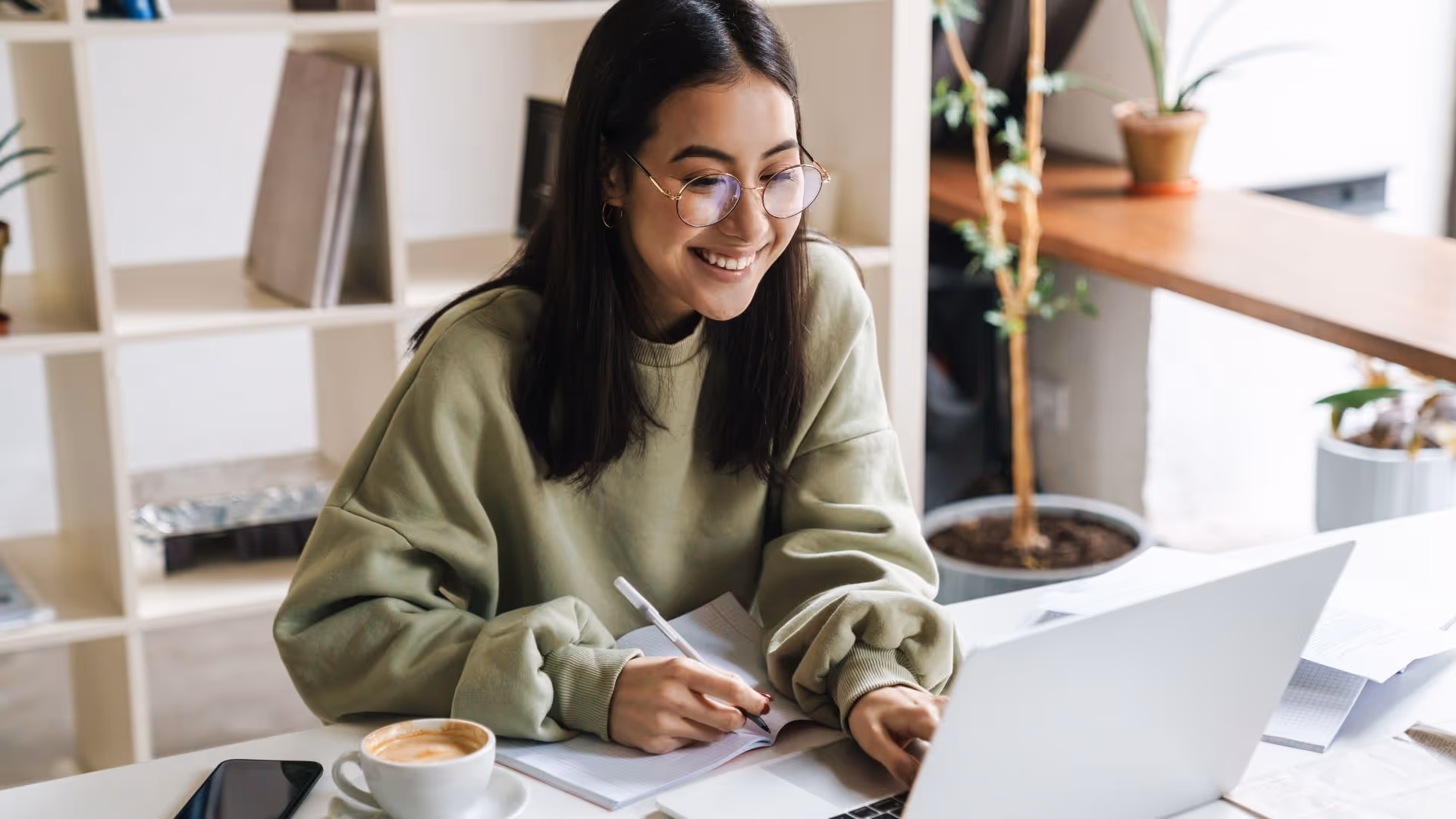 Woman typing on computer stock image