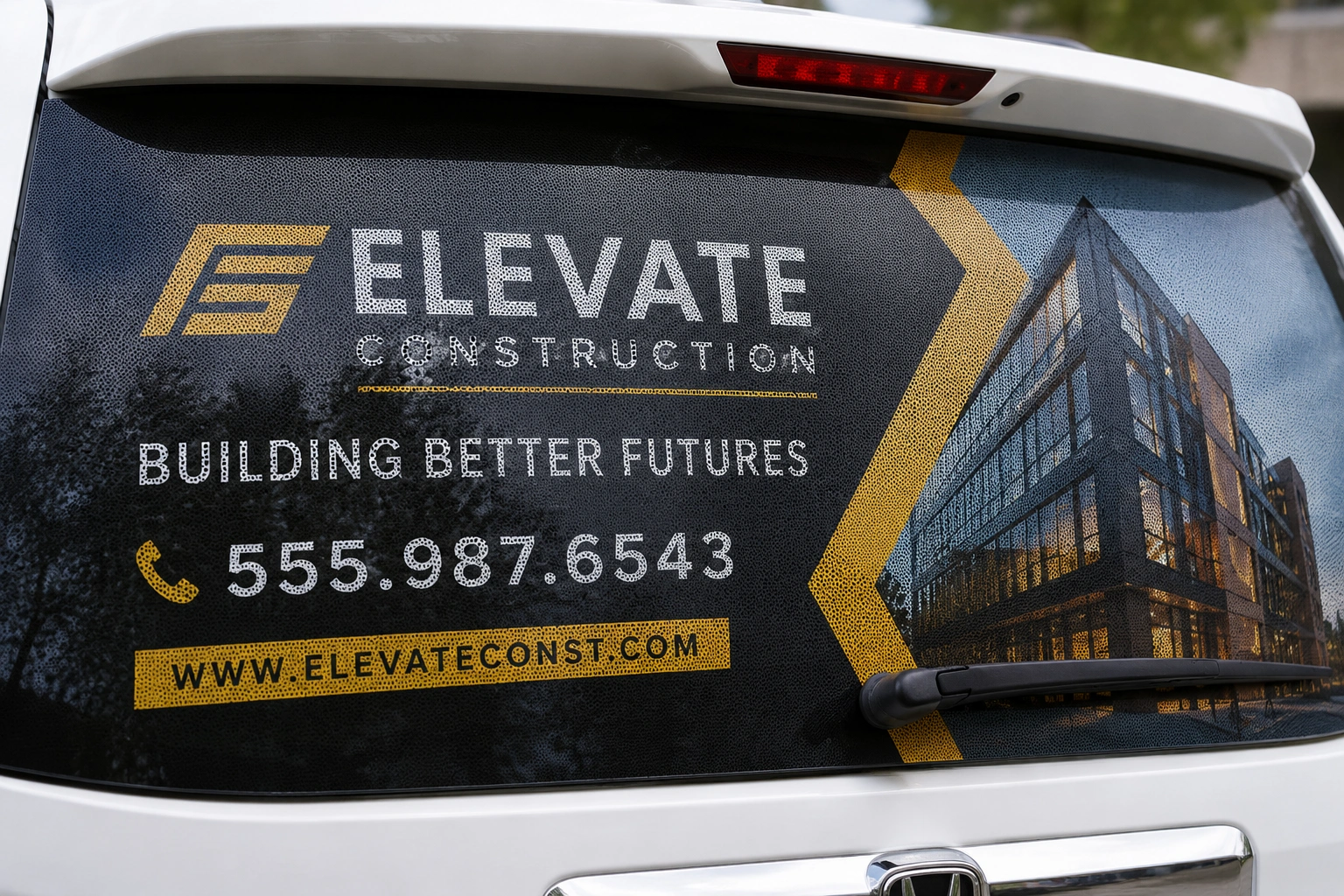 Perforated car window decals and one-way vision vehicle graphics