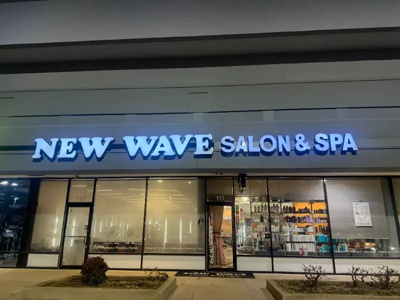 Illuminated storefront sign for nighttime business visibility