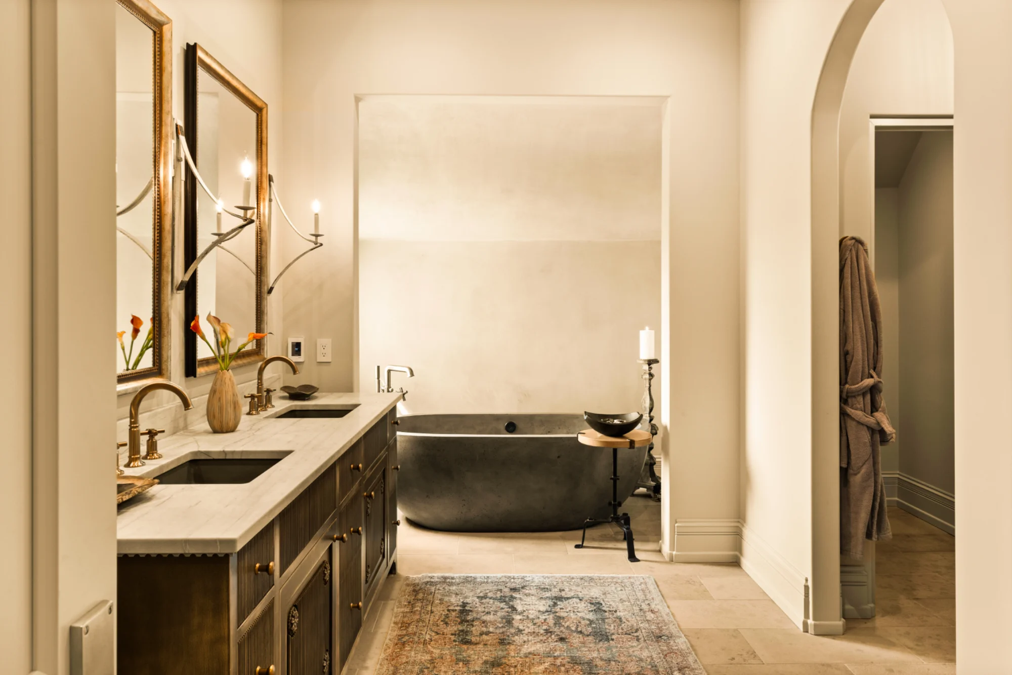 Primary bathroom with double vanity and bathtub