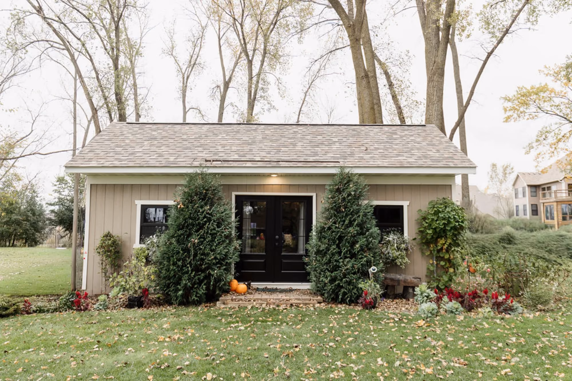 Single-story house exterior with front porch and lawn