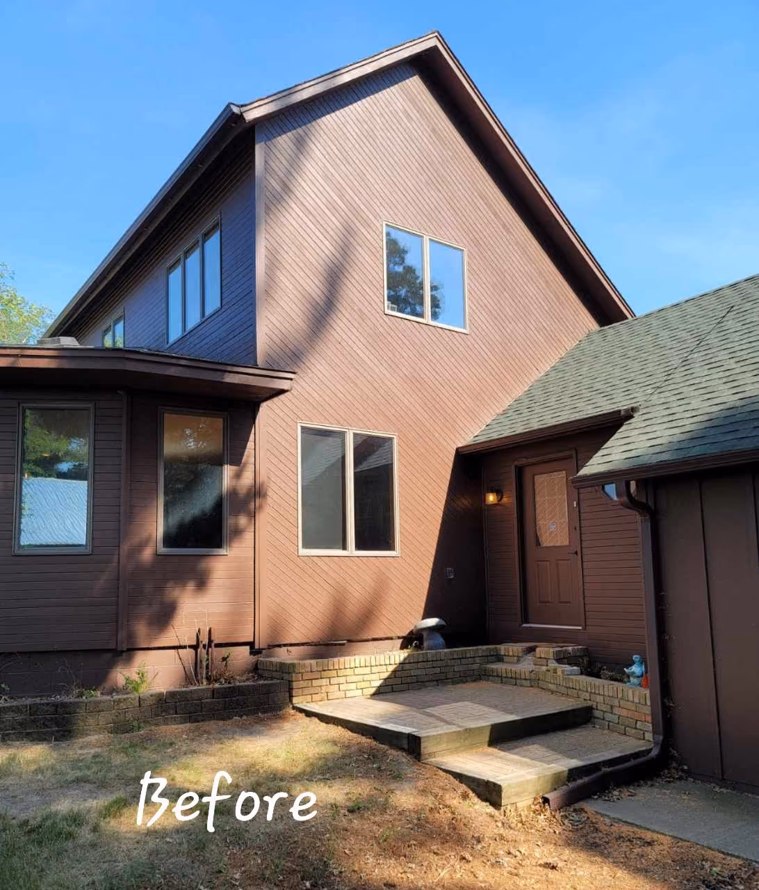 Two-story house exterior with covered porch