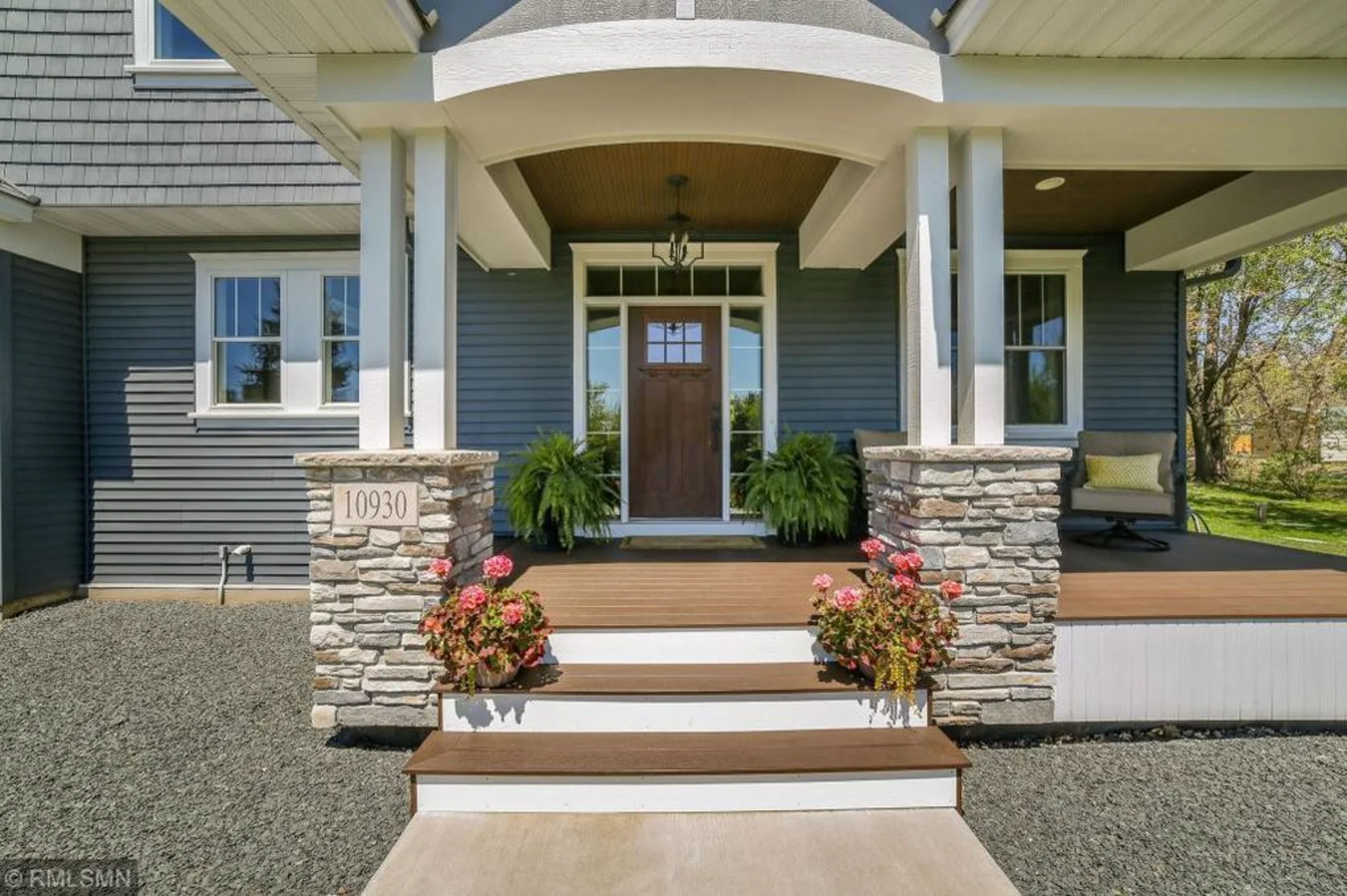 Front porch entry with columns and stone steps