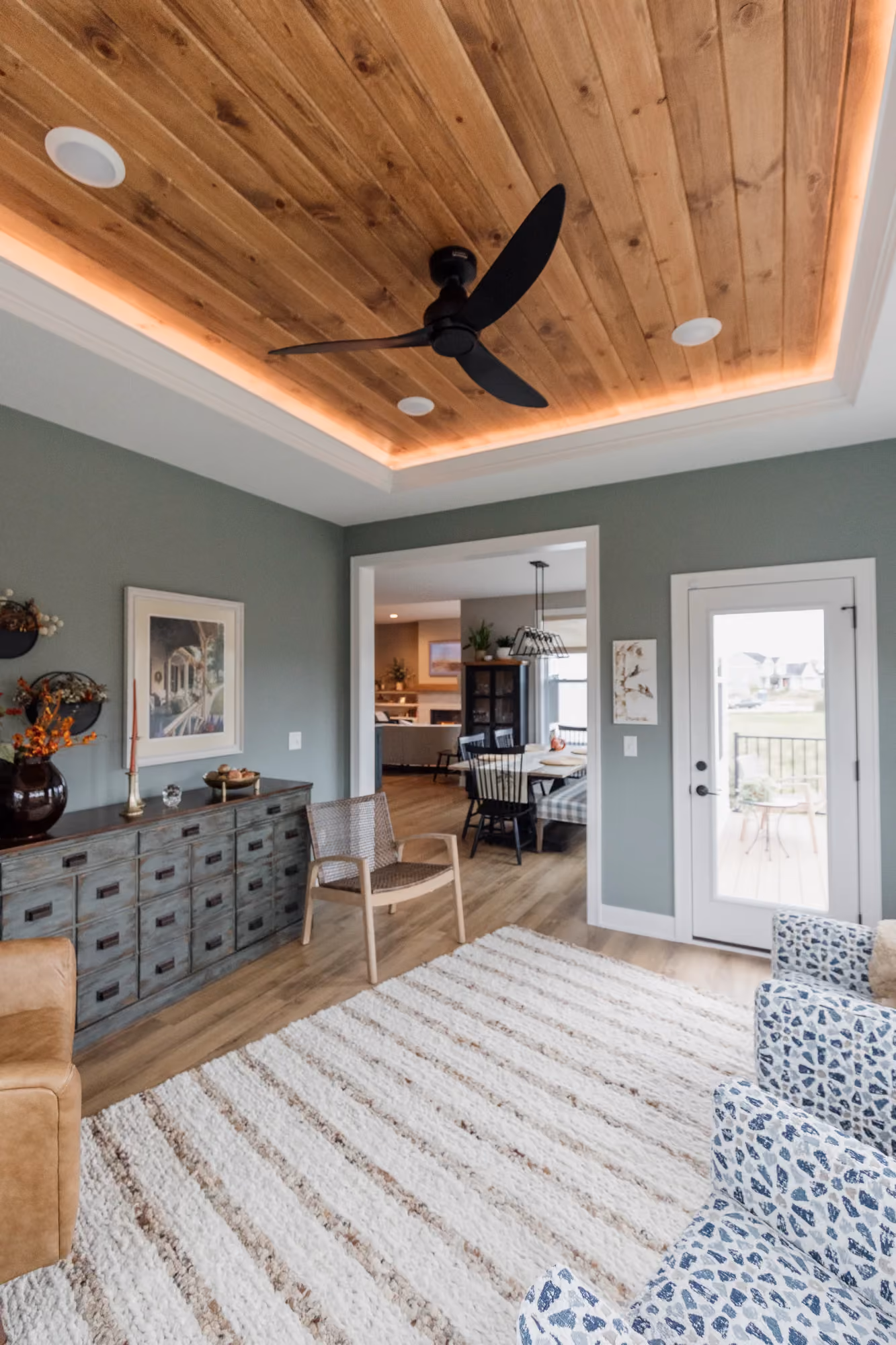 Living room and kitchen entry with coffered ceiling