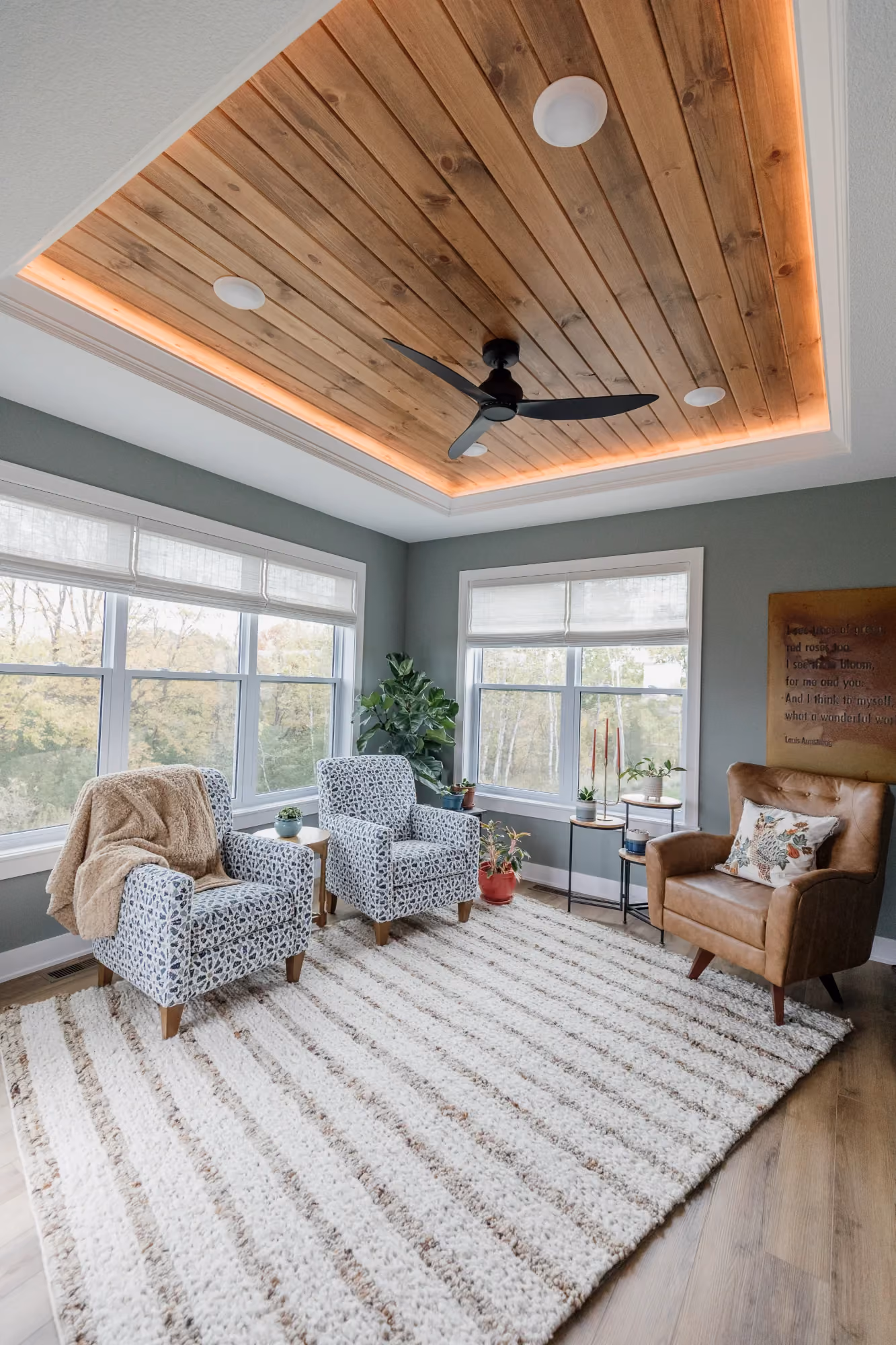 Open living room with high wood ceiling and seating area