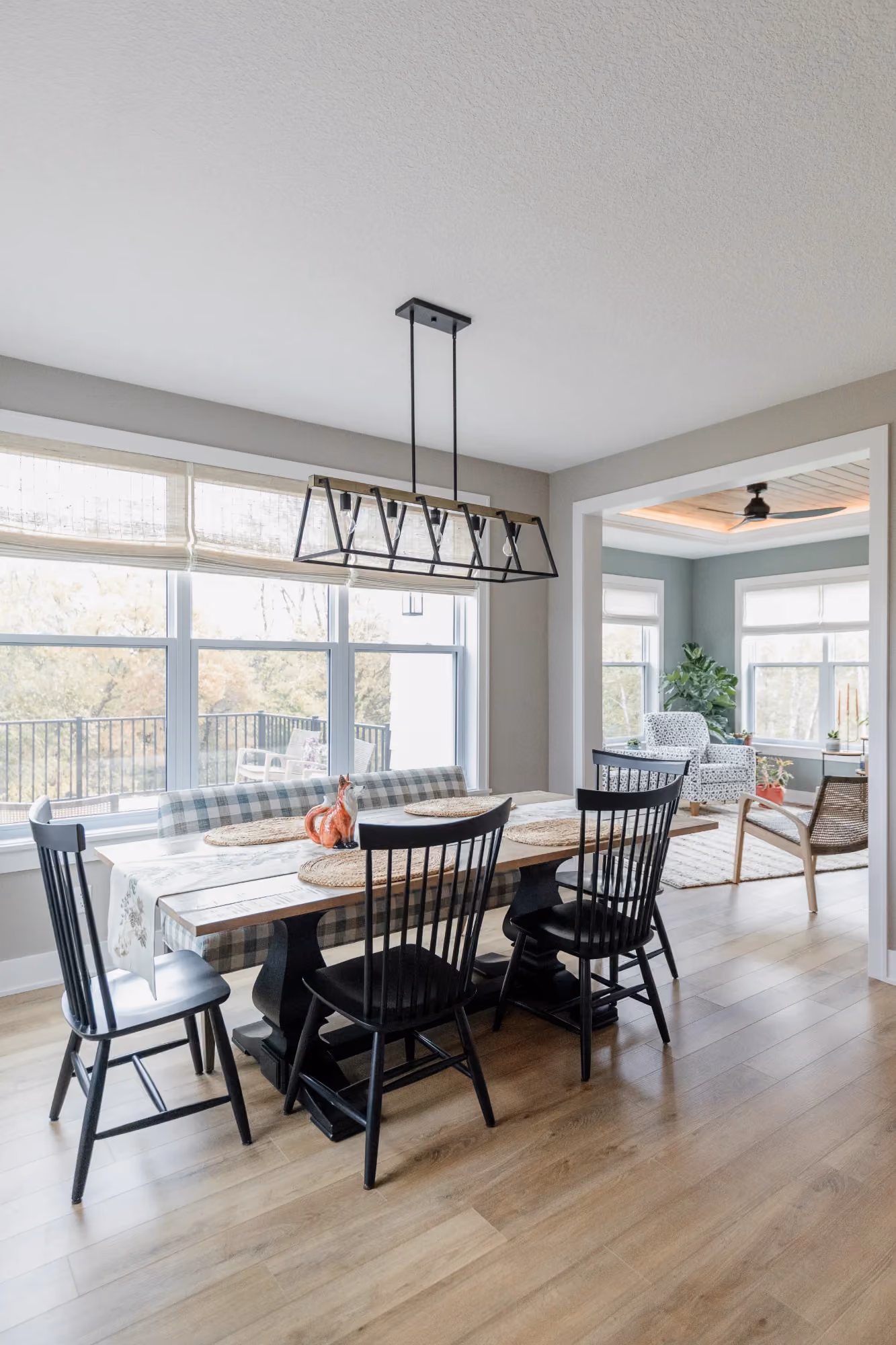 Dining area with table and chairs in open-plan space
