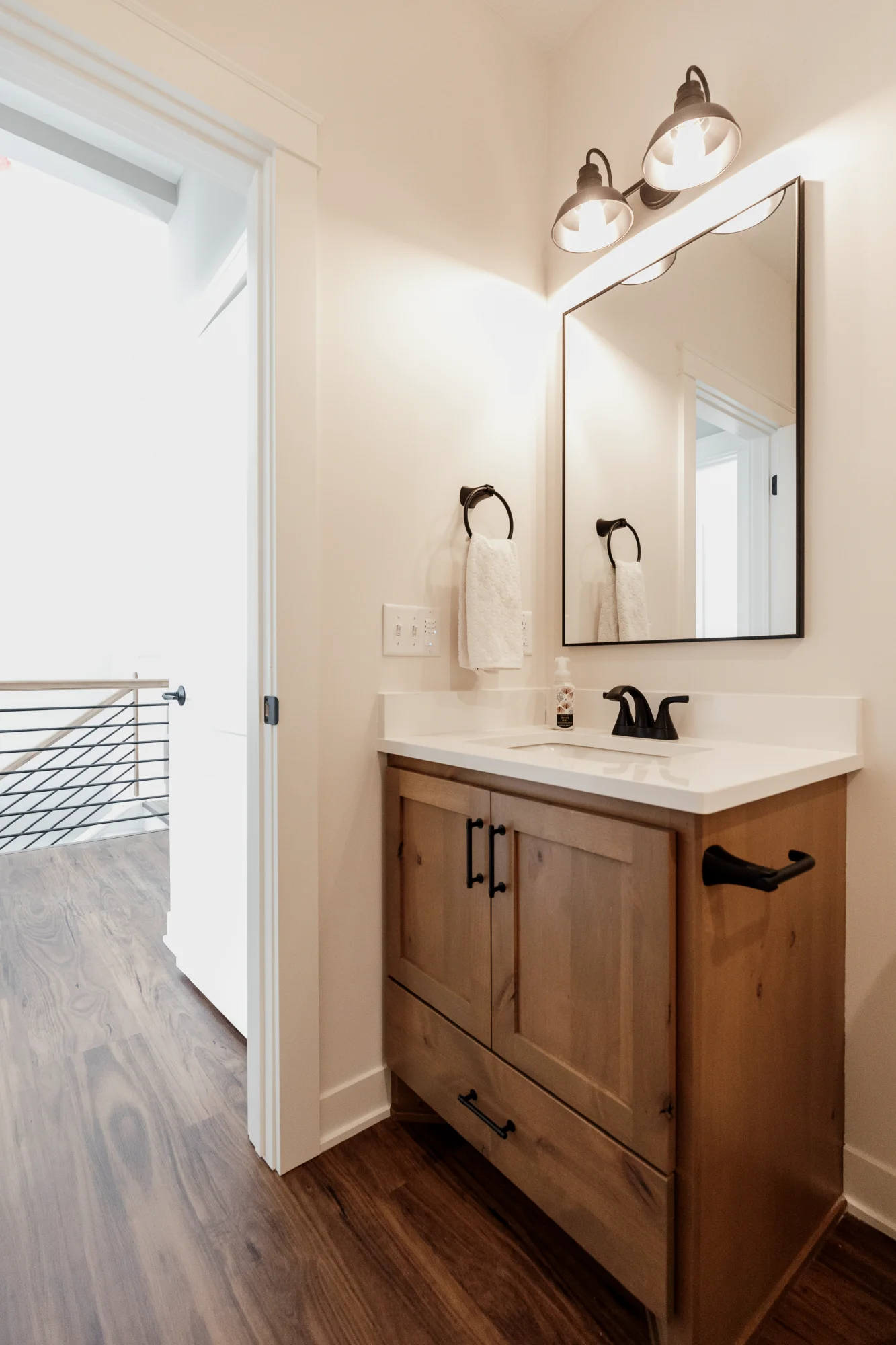 Single vanity with mirror and wall lights