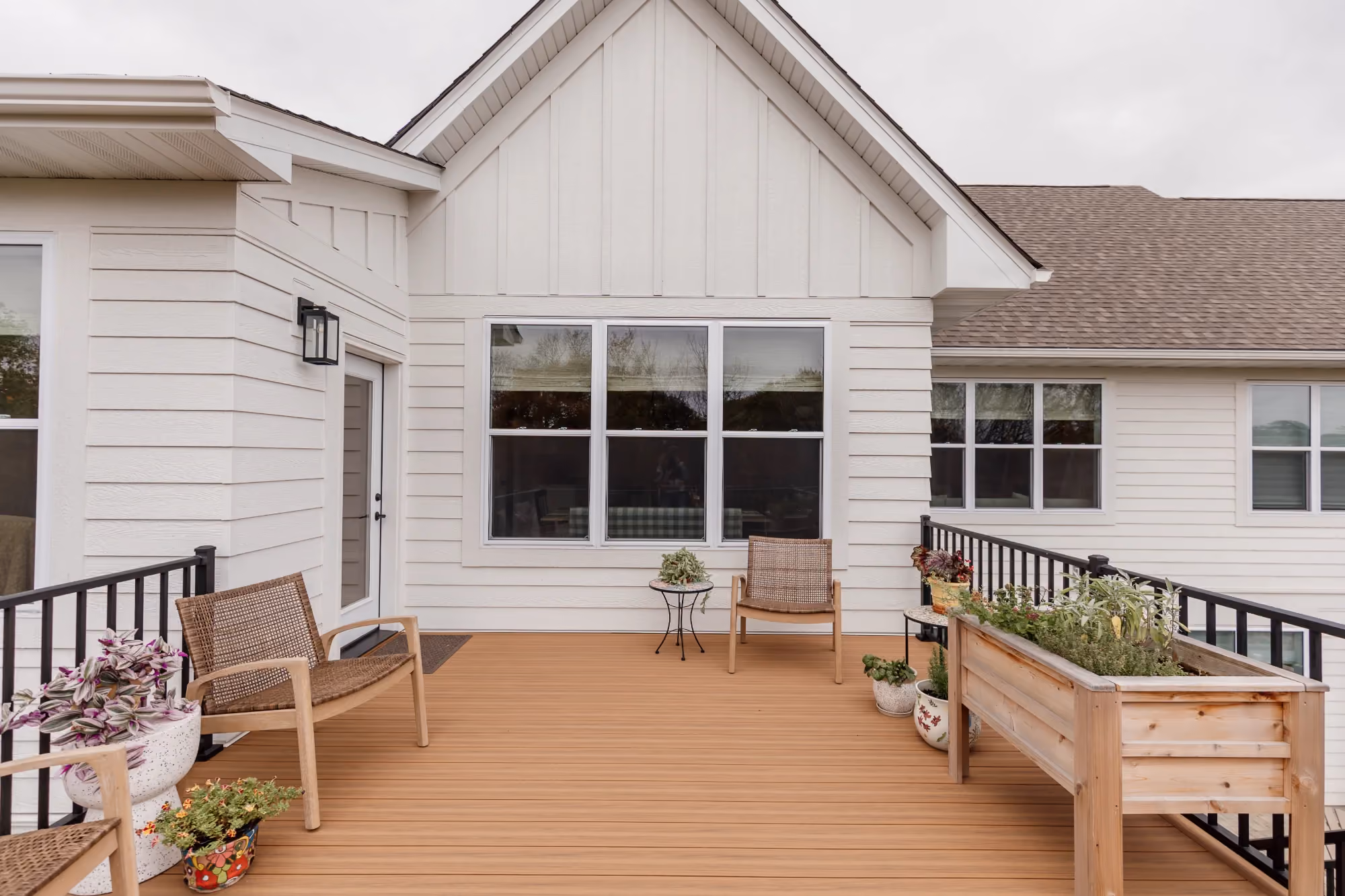 Back of house with deck seating area