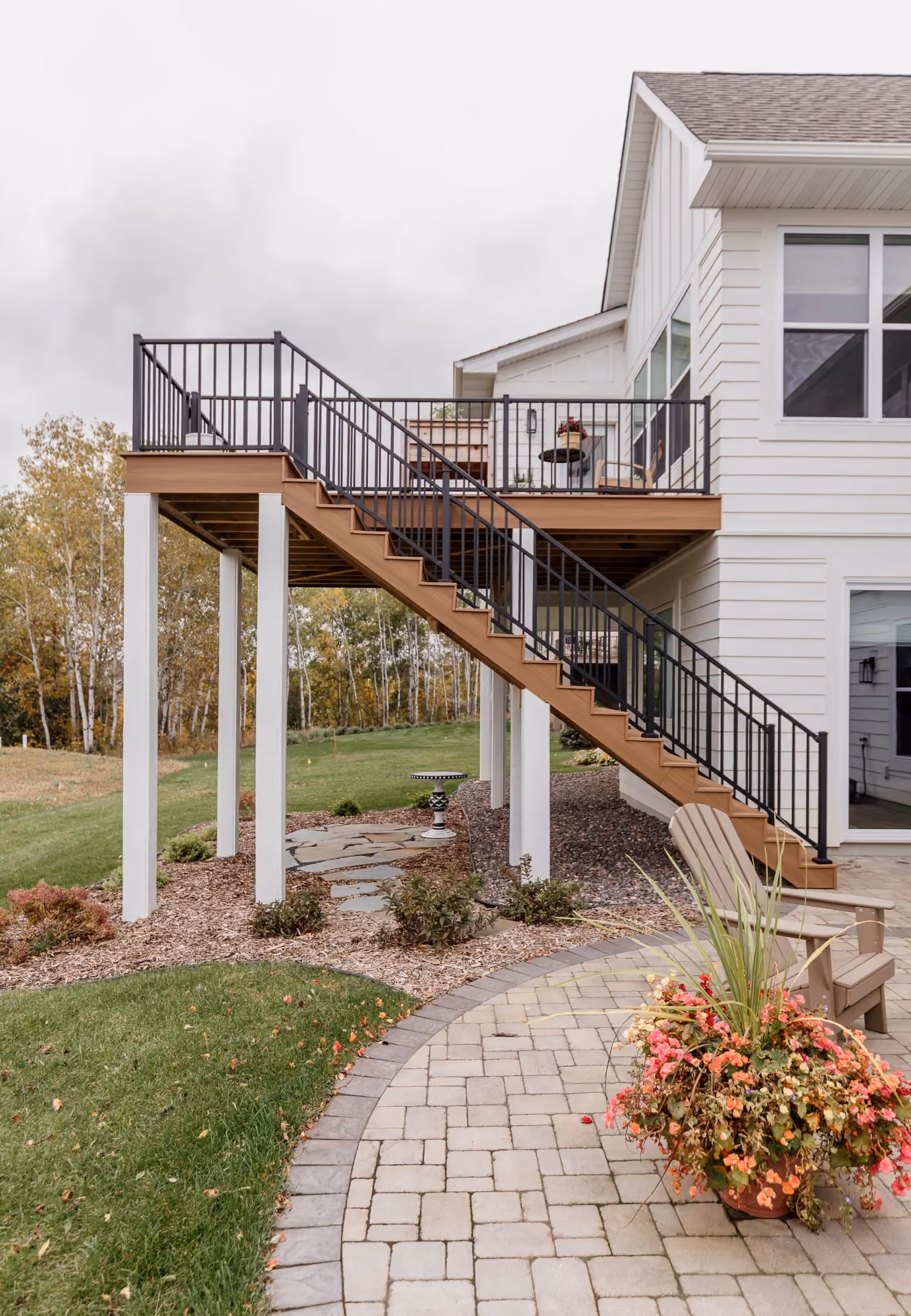 Exterior staircase leading to an elevated deck