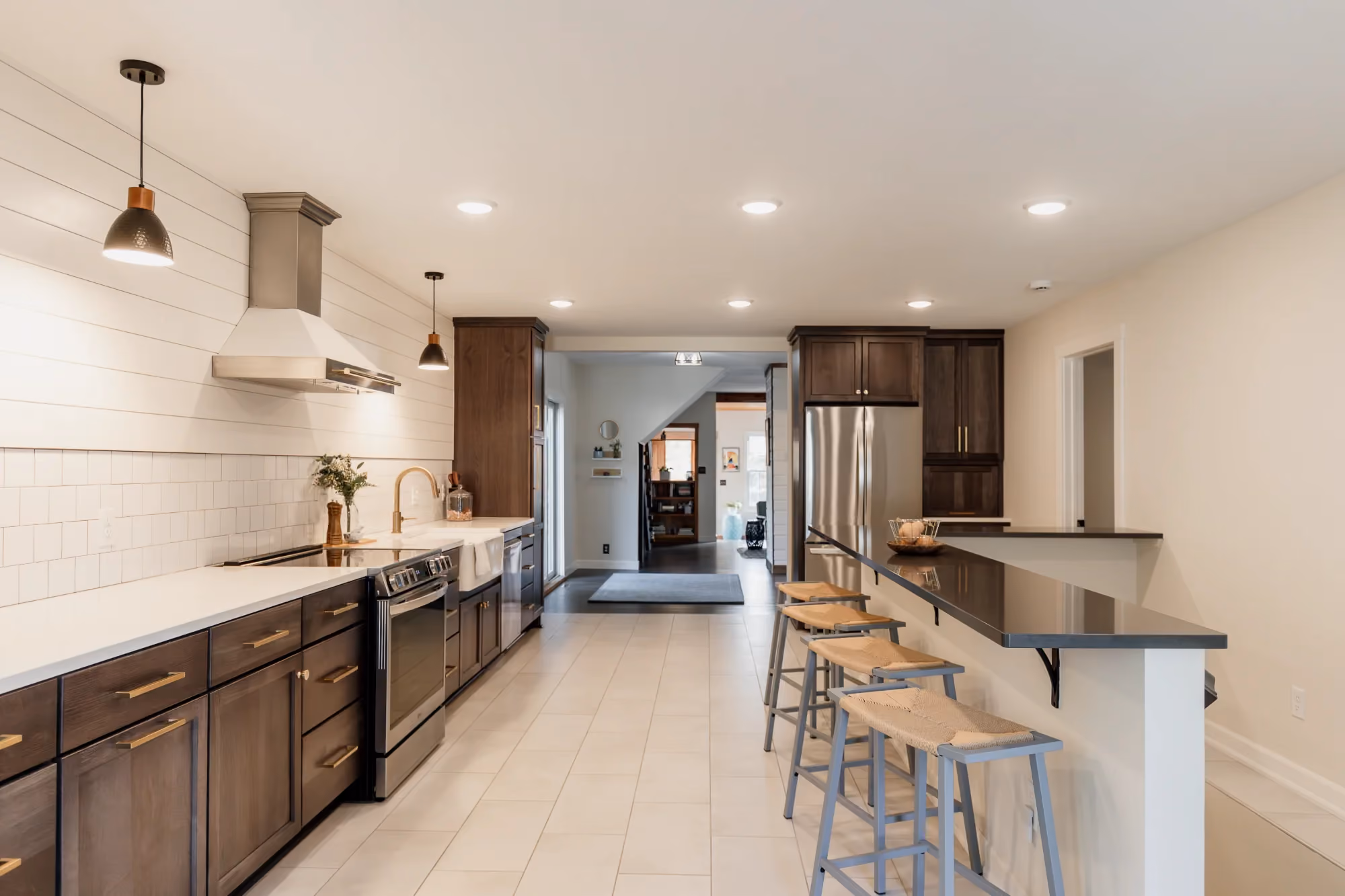 Wide view of modern kitchen with island seating