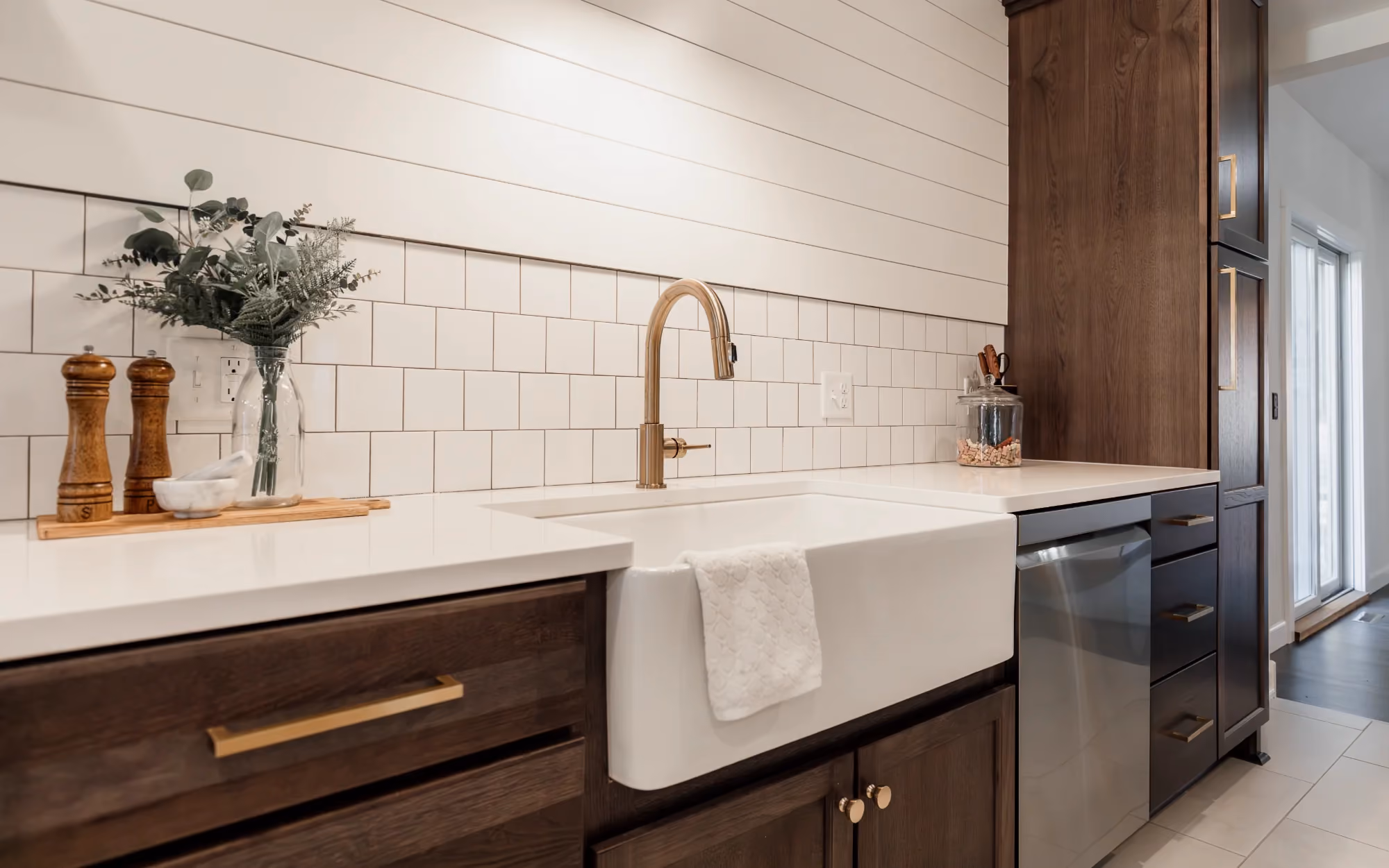 Modern kitchen with farmhouse sink and dark cabinets