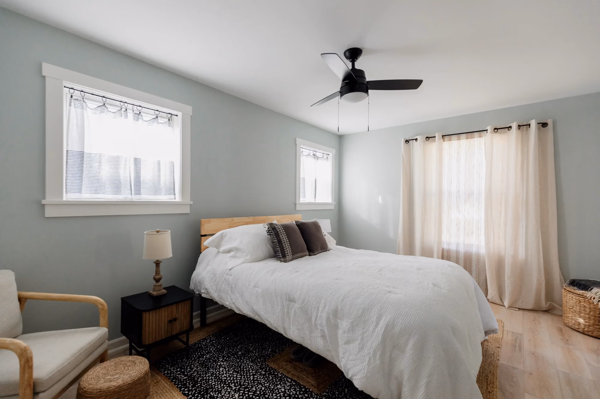 Bedroom with gray walls and window