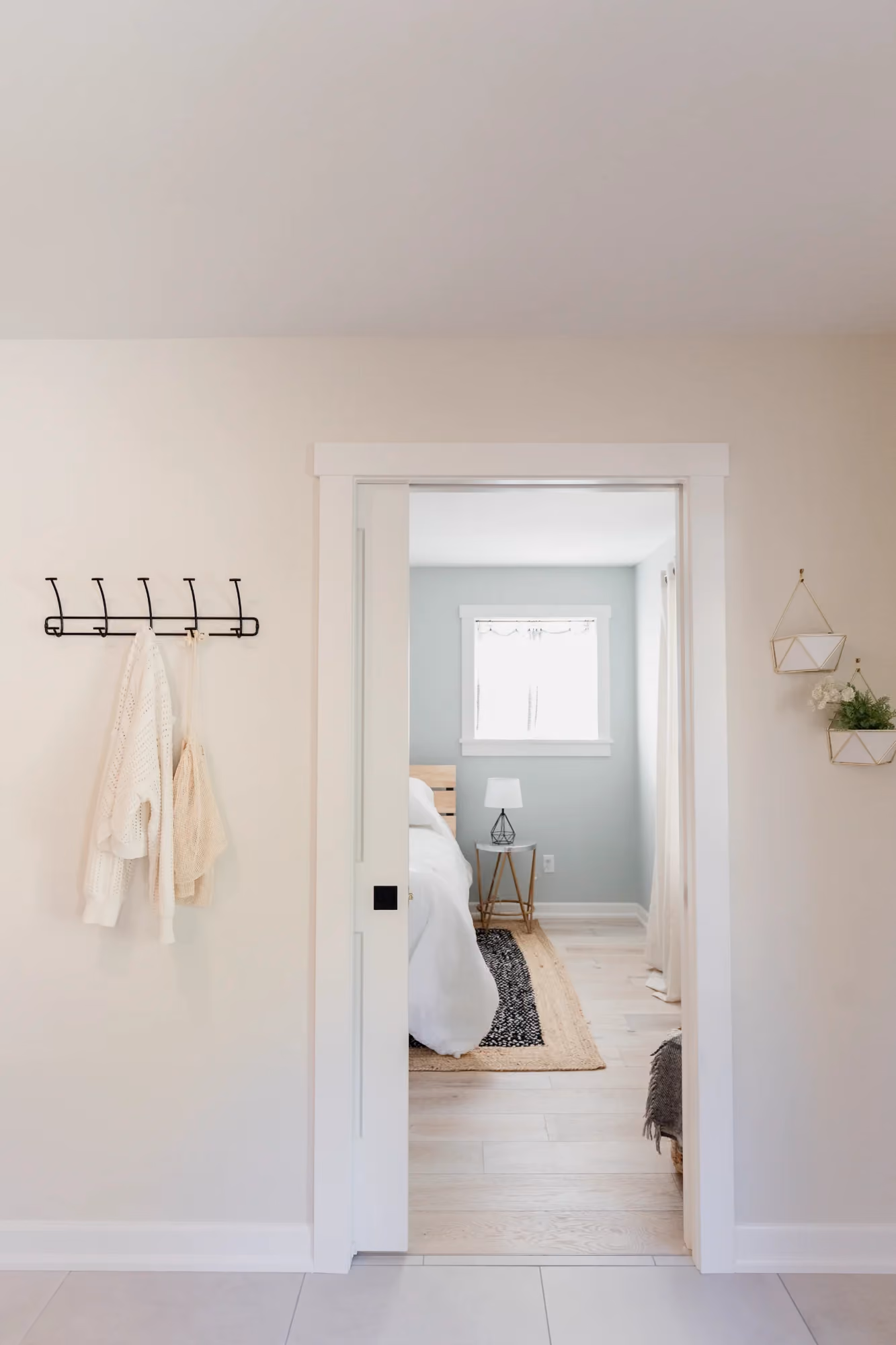 Hallway leading to a bathroom