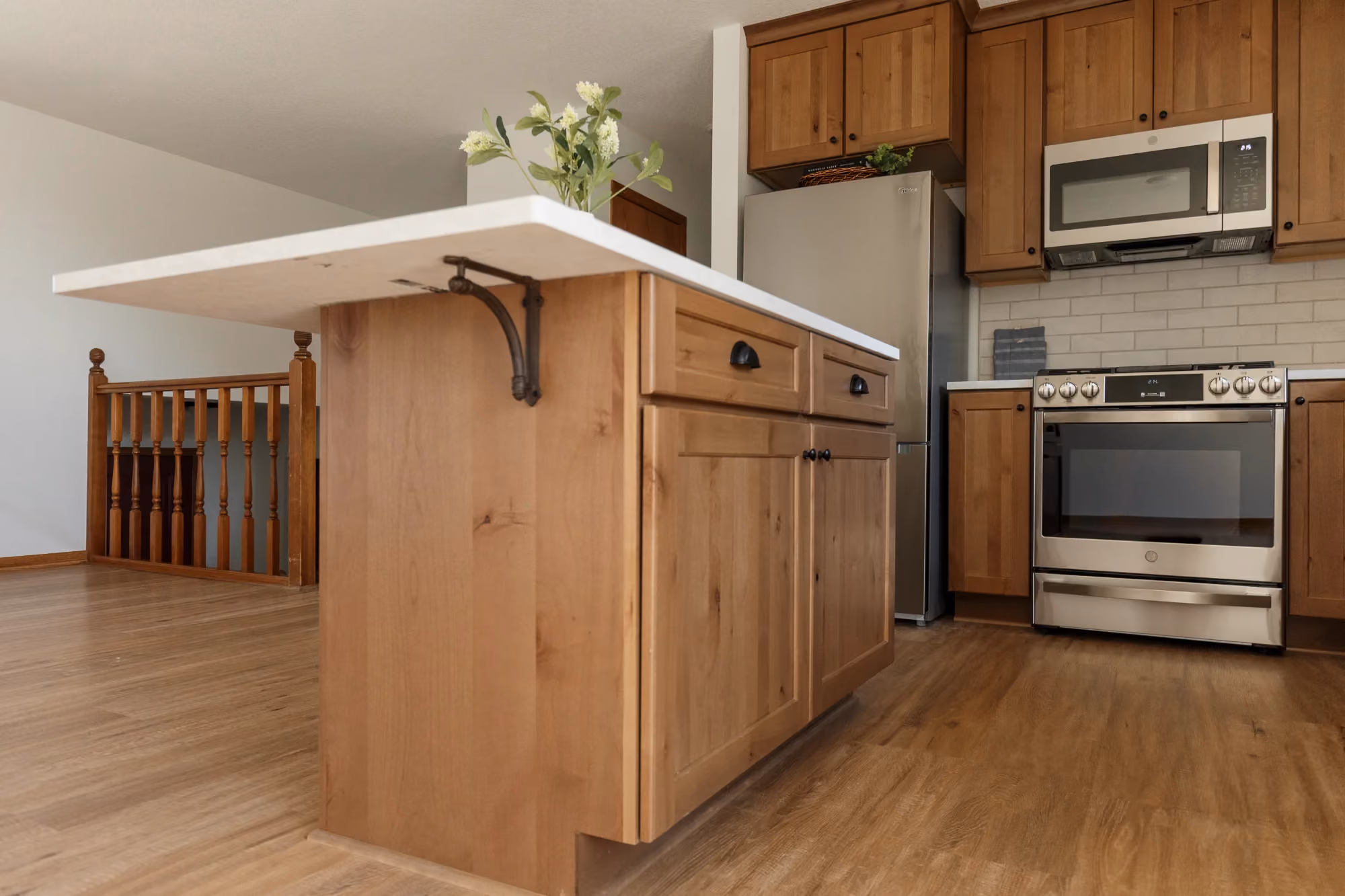 Close-up of kitchen island with wood base and countertop
