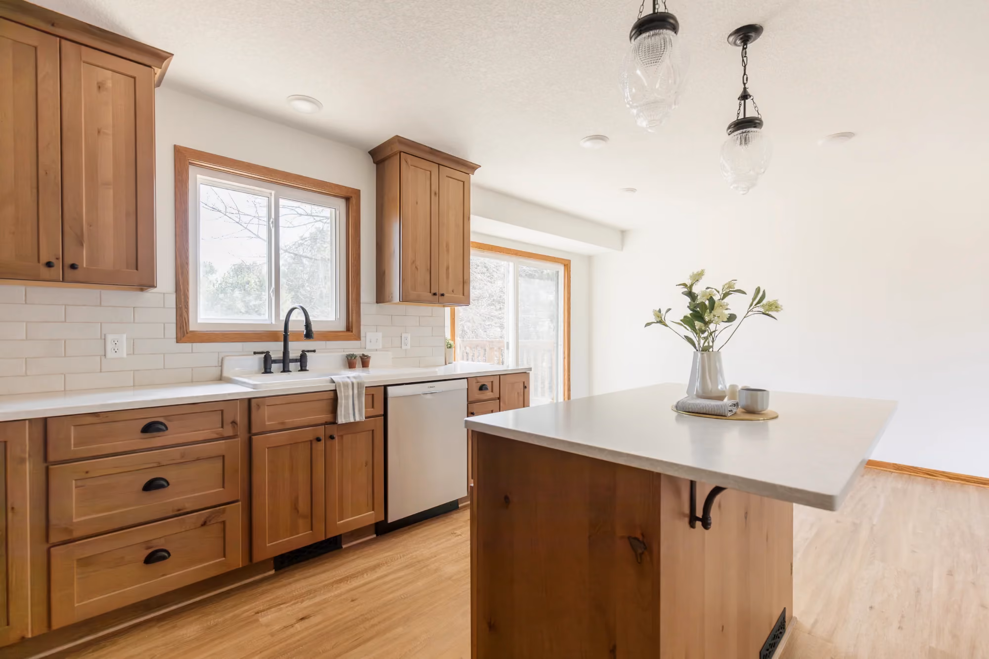 Kitchen with large island and wood cabinetry