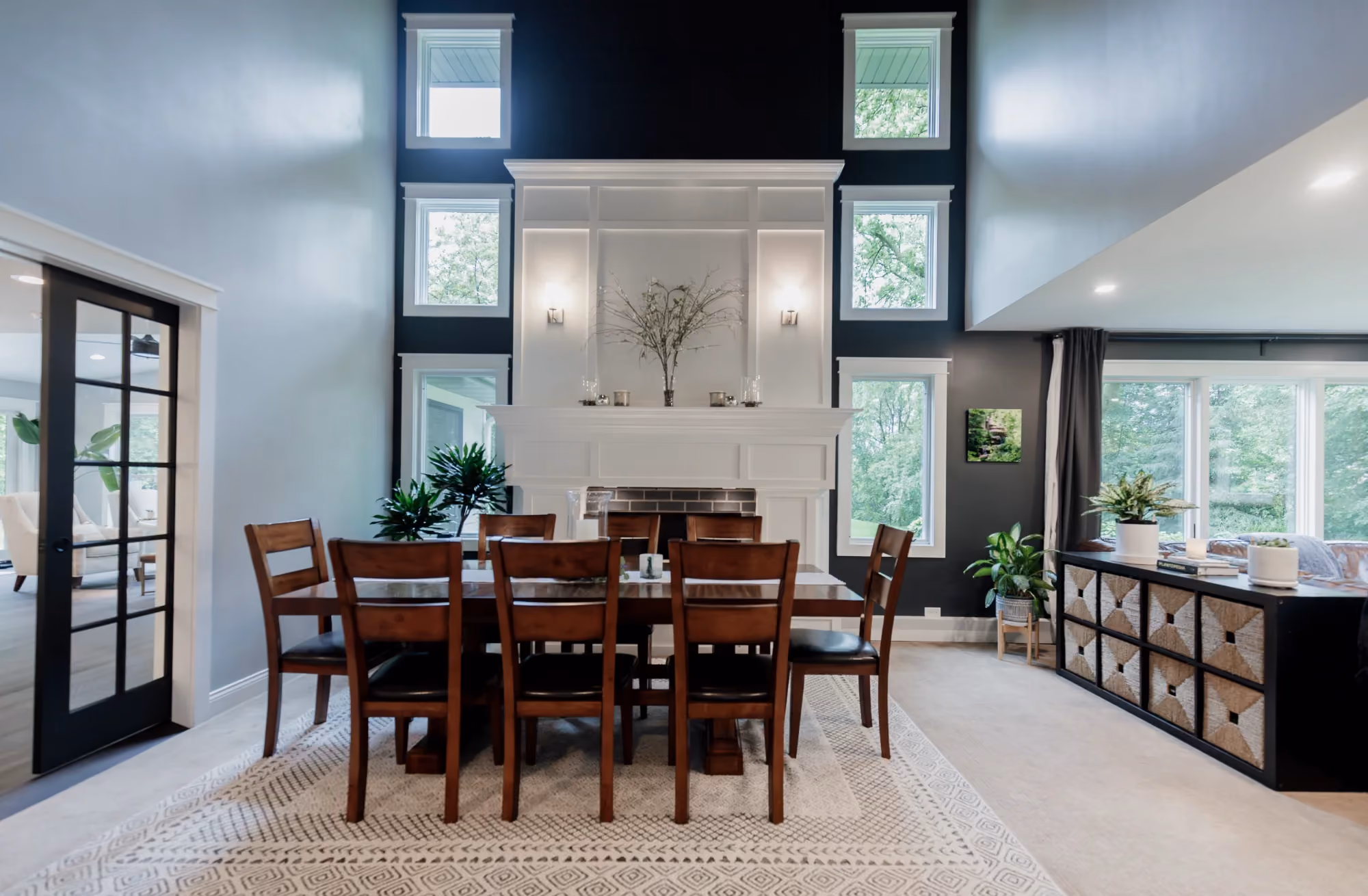 Modern dining room with large windows and wooden table