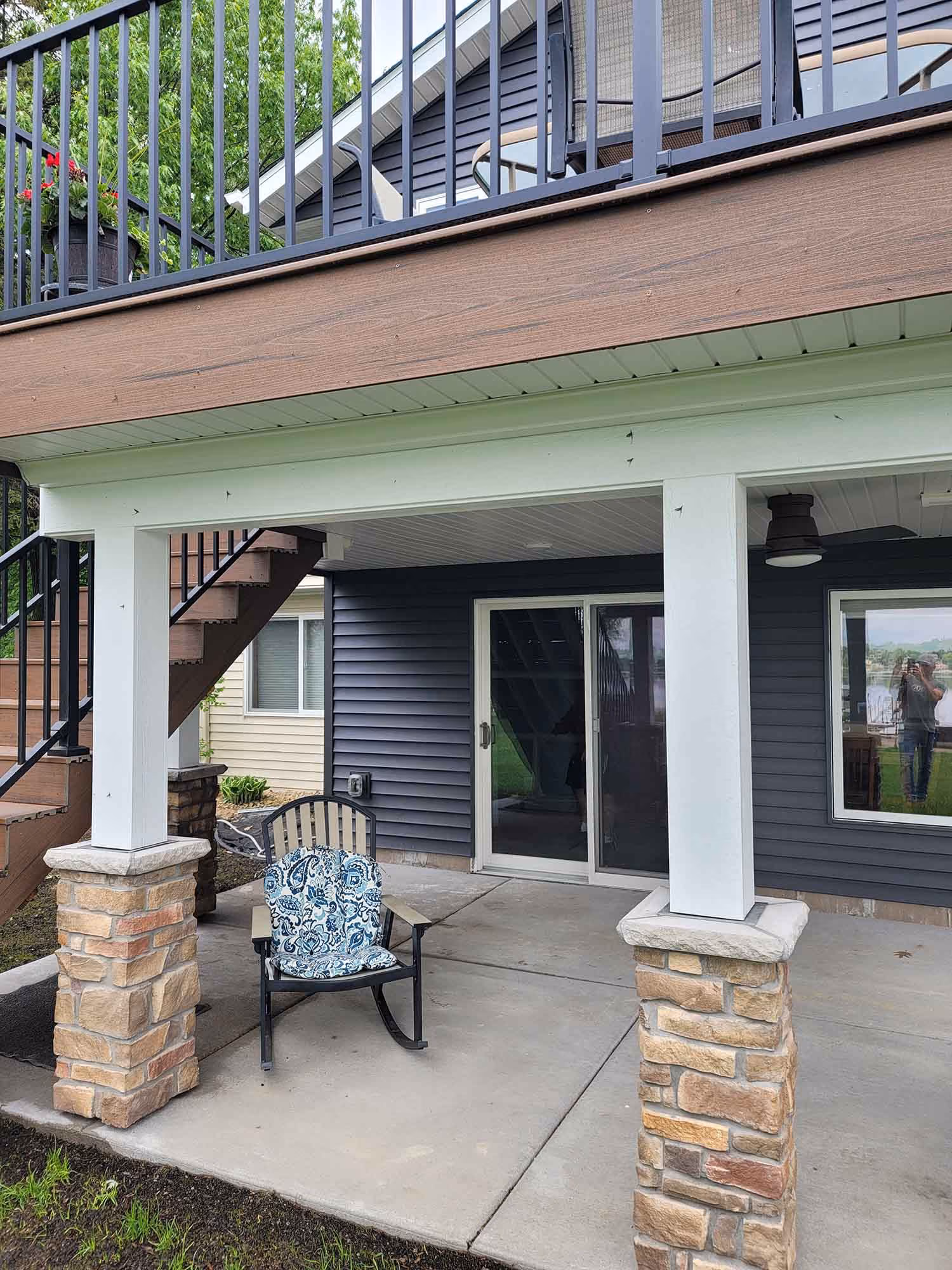 Covered patio with outdoor seating under deck