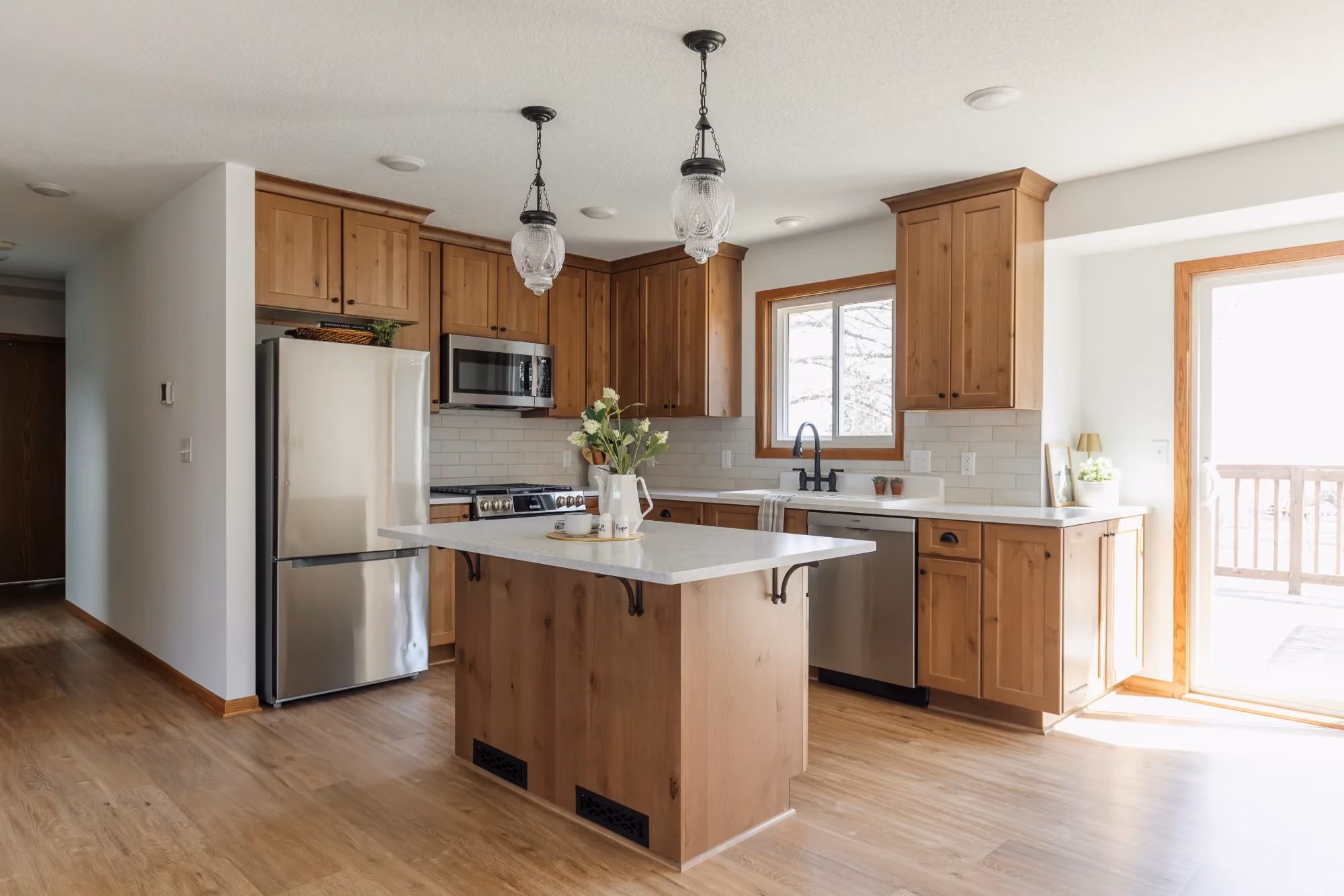 Modern kitchen with island and pendant lights - 2