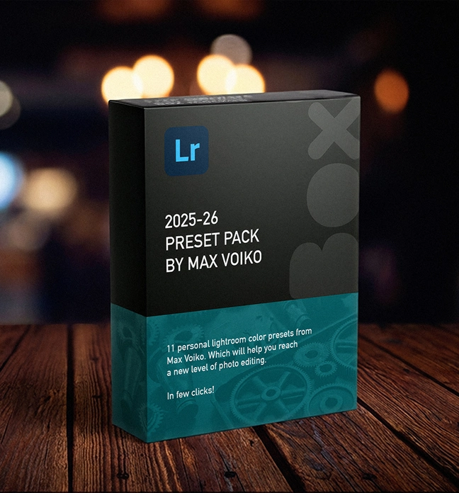 Black and teal box labeled '2025-26 Preset Pack by Max Voiko' for Lightroom presets, placed on a wooden surface with blurred lights in the background.